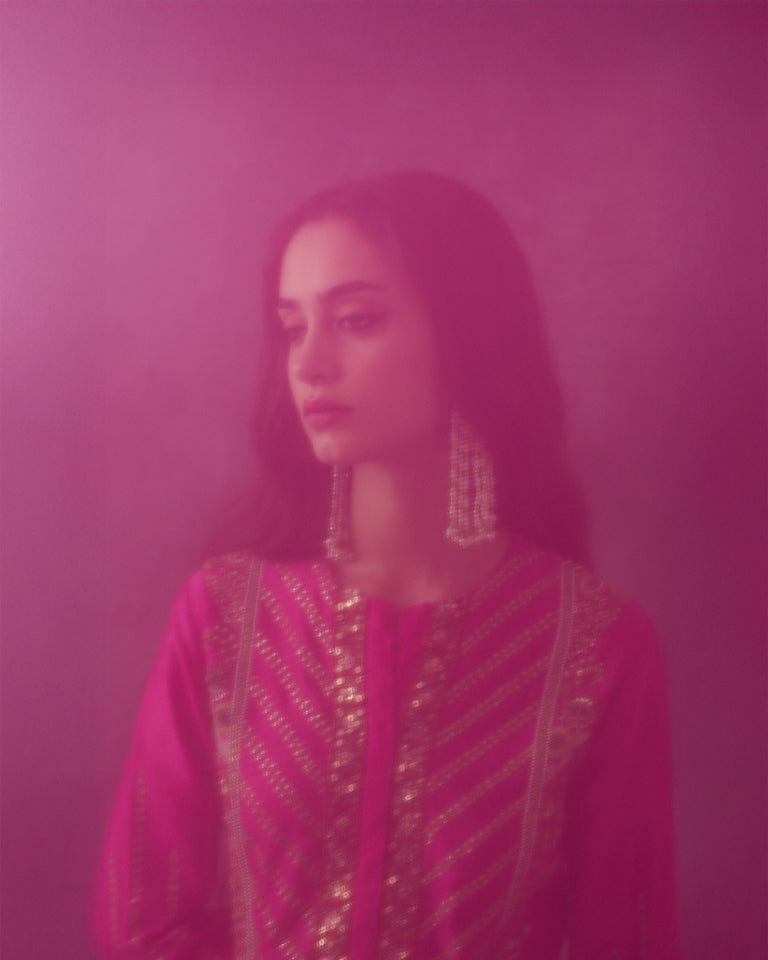 Gulrez short kurti with sharara & dupatta.