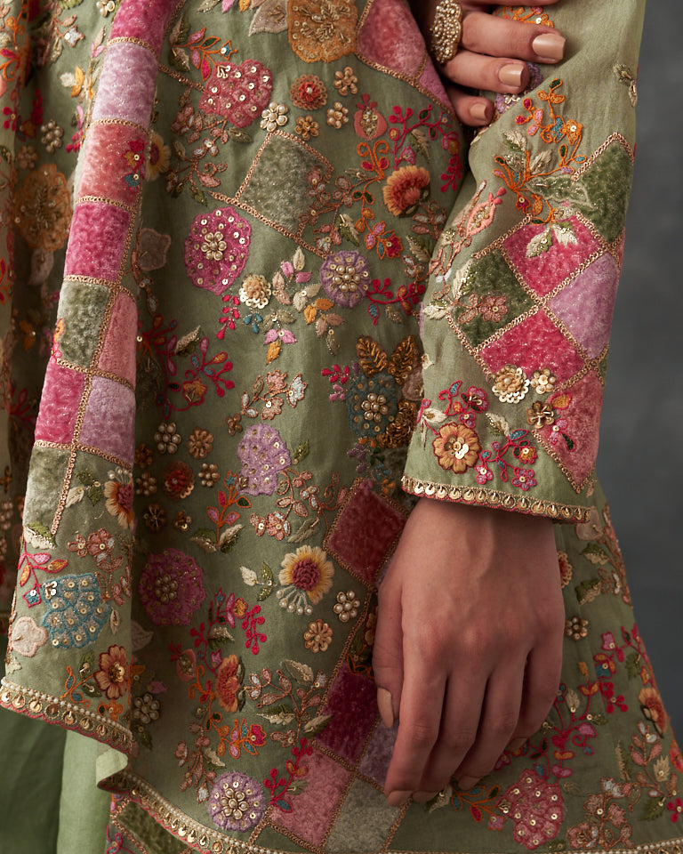 Velvet patchwork Peplum with heavy embroidered sharara.