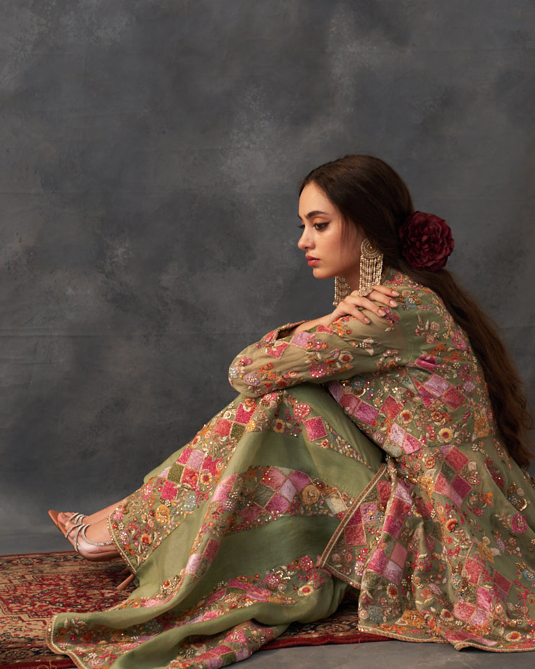 Velvet patchwork Peplum with heavy embroidered sharara.