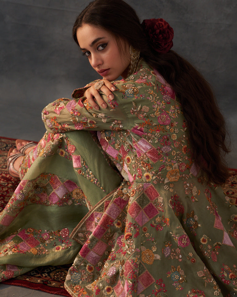 Velvet patchwork Peplum with heavy embroidered sharara.