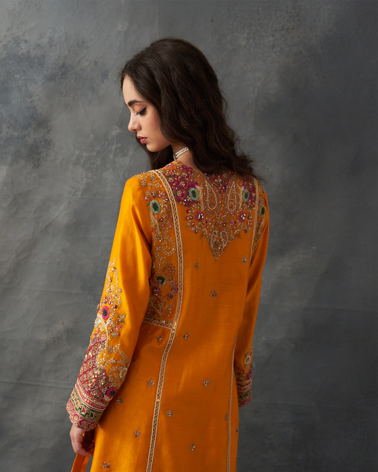 Gulrez short kurti with straight cut pants.