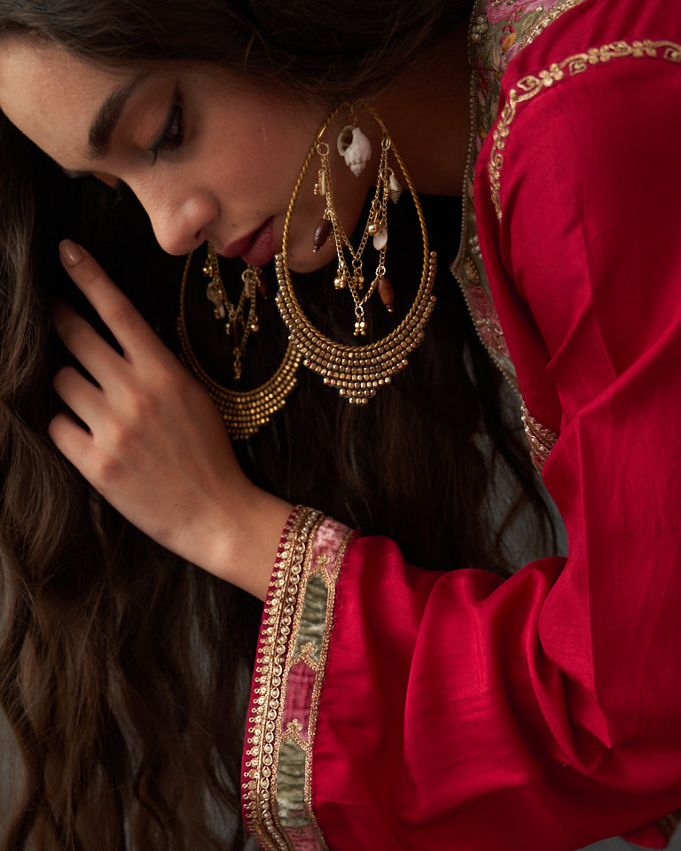 Velvet patchwork Asymetrical Kurta with embroidered pants.