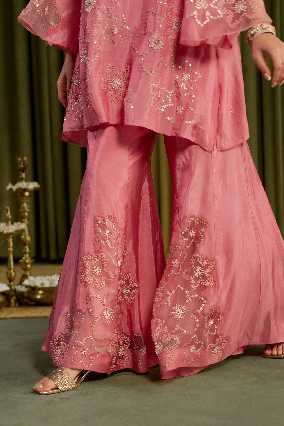 Rose pink sharara set with hand embroidered floral pattern.