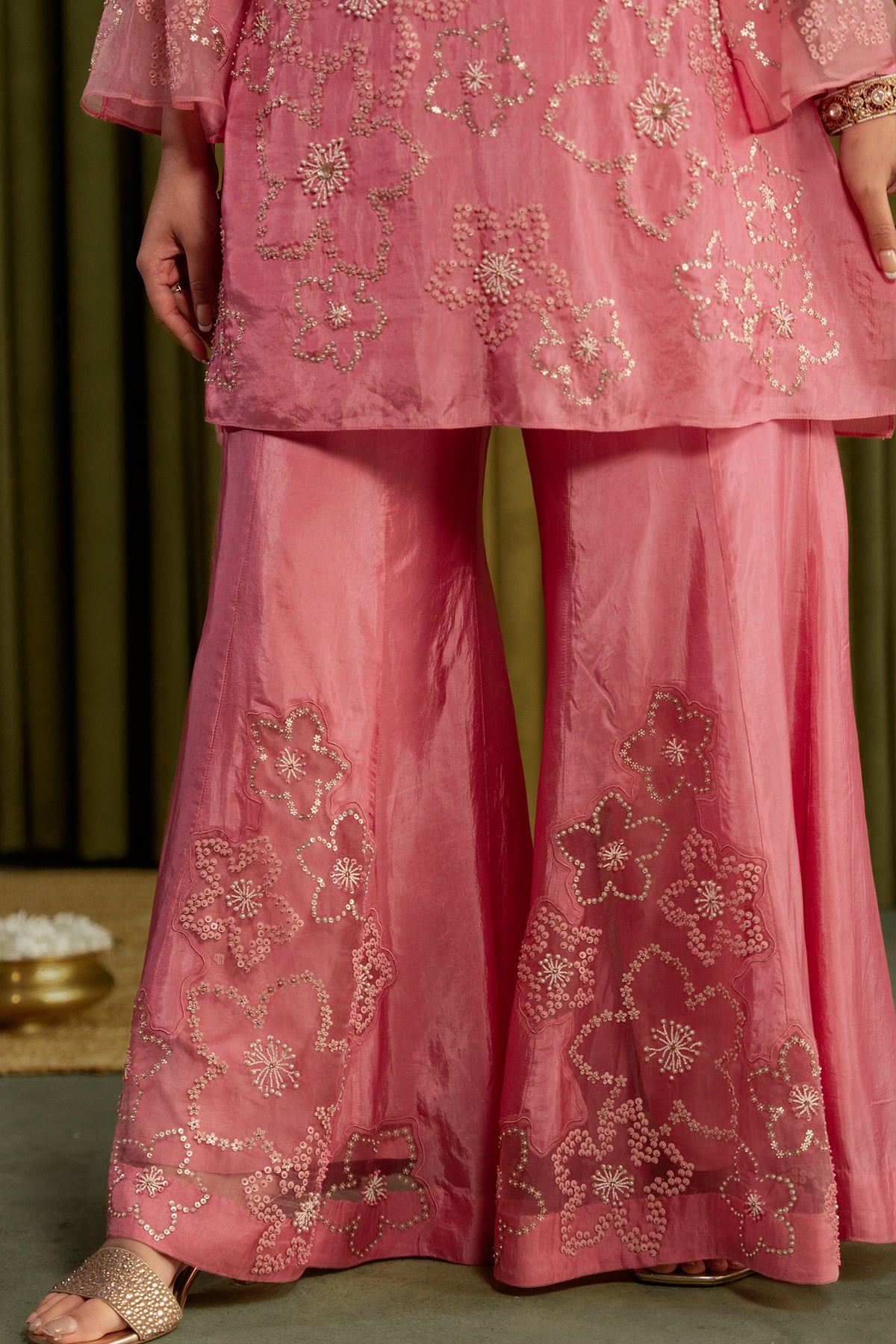 Rose pink sharara set with hand embroidered floral pattern.