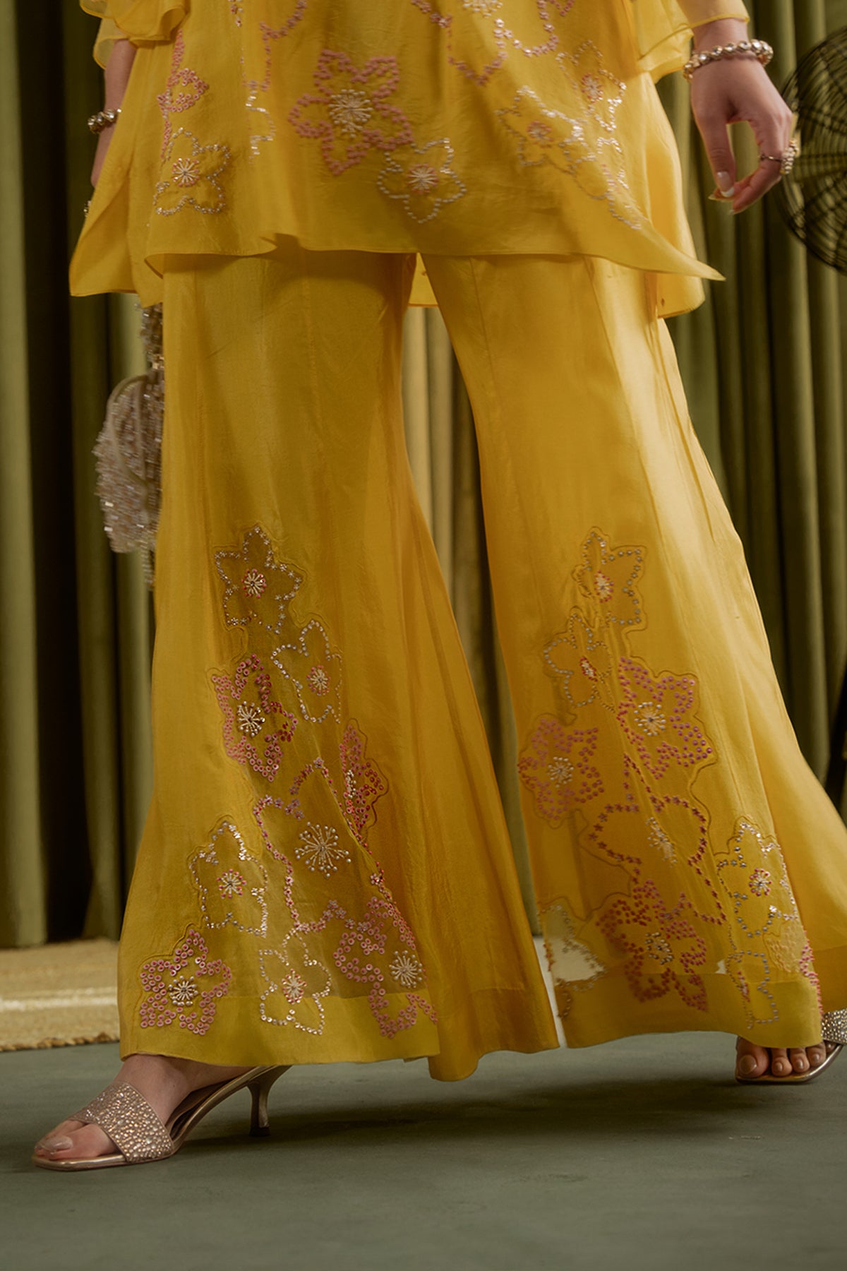 Mango sharara set with hand embroidered floral pattern.
