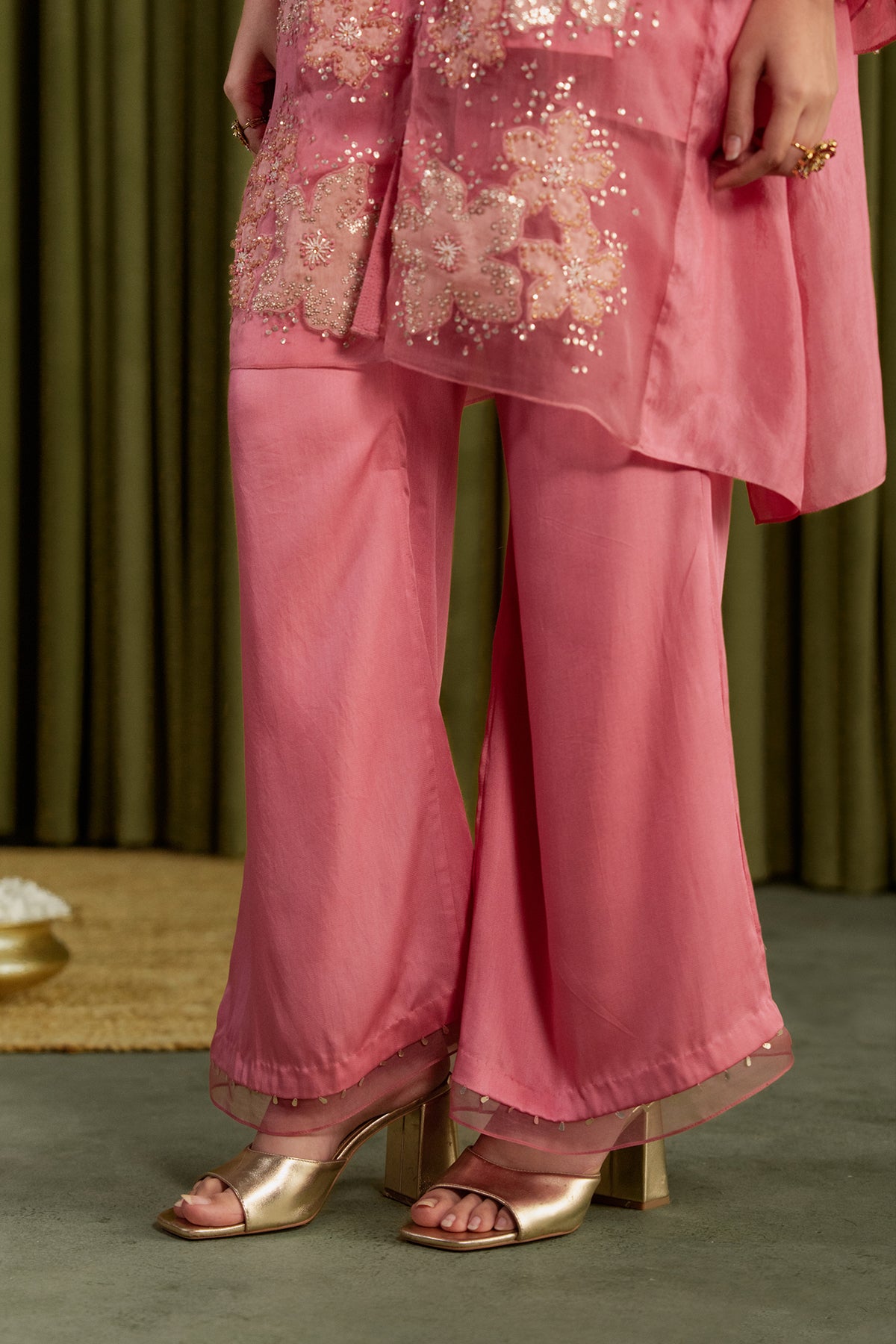 Rose pink co-ord set with embroidered floral pattern.