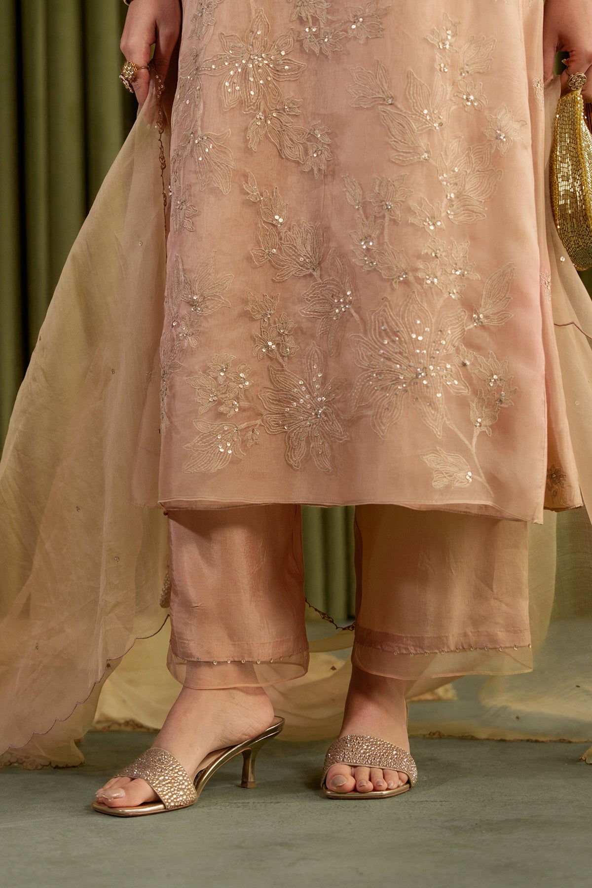 Golden beige kalidar kurta set with delicate floral embroidery.