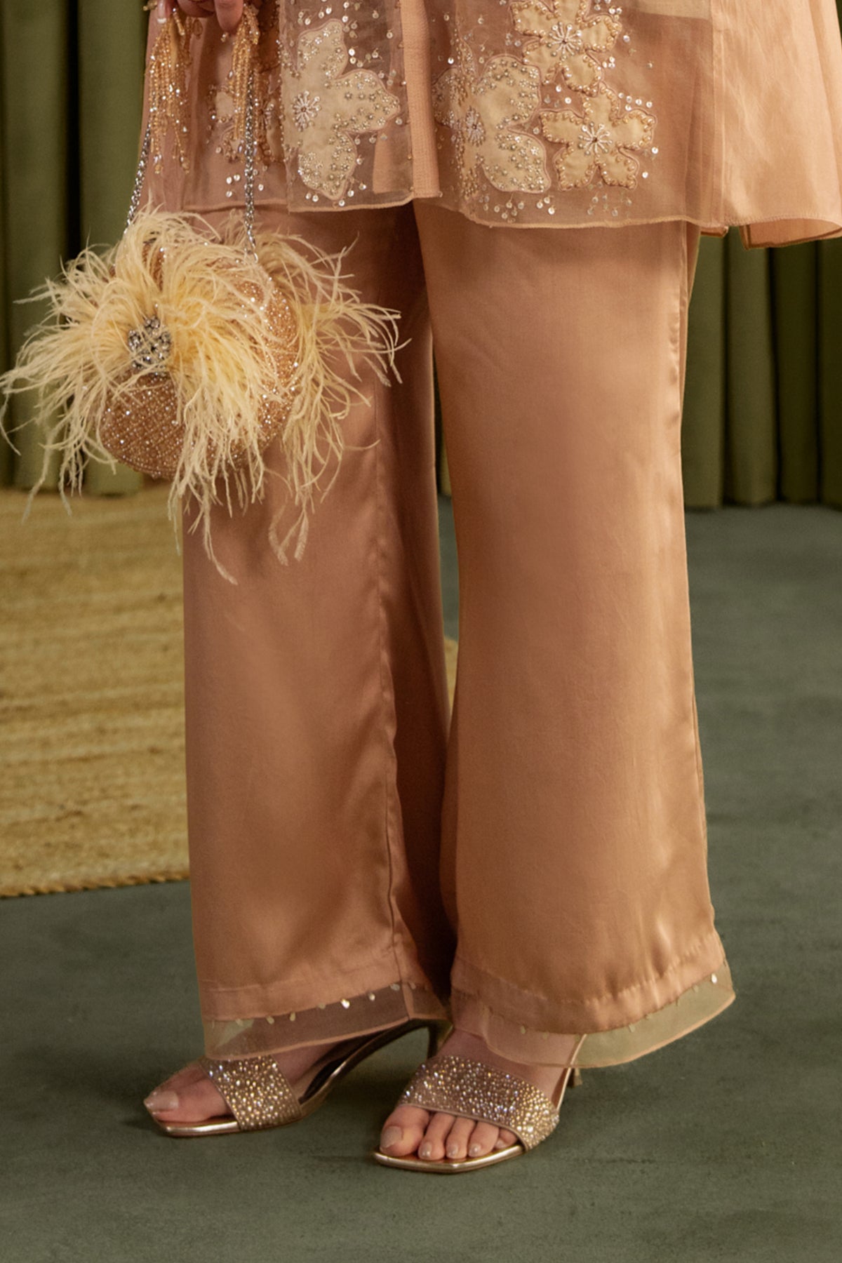 Golden beige co-ord set with embroidered floral pattern.