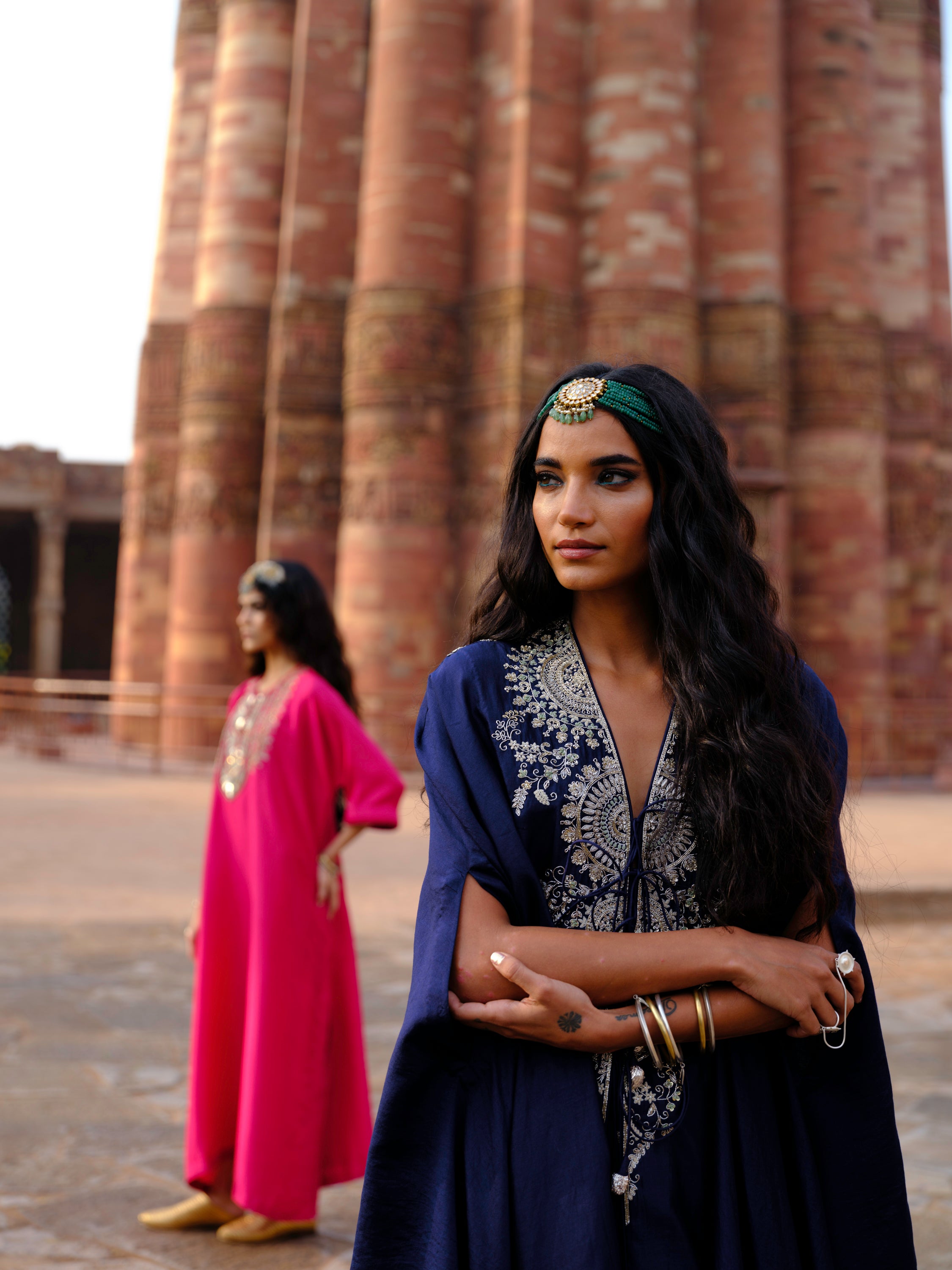 Featuring a cape in silk base with  zardosi embroidery