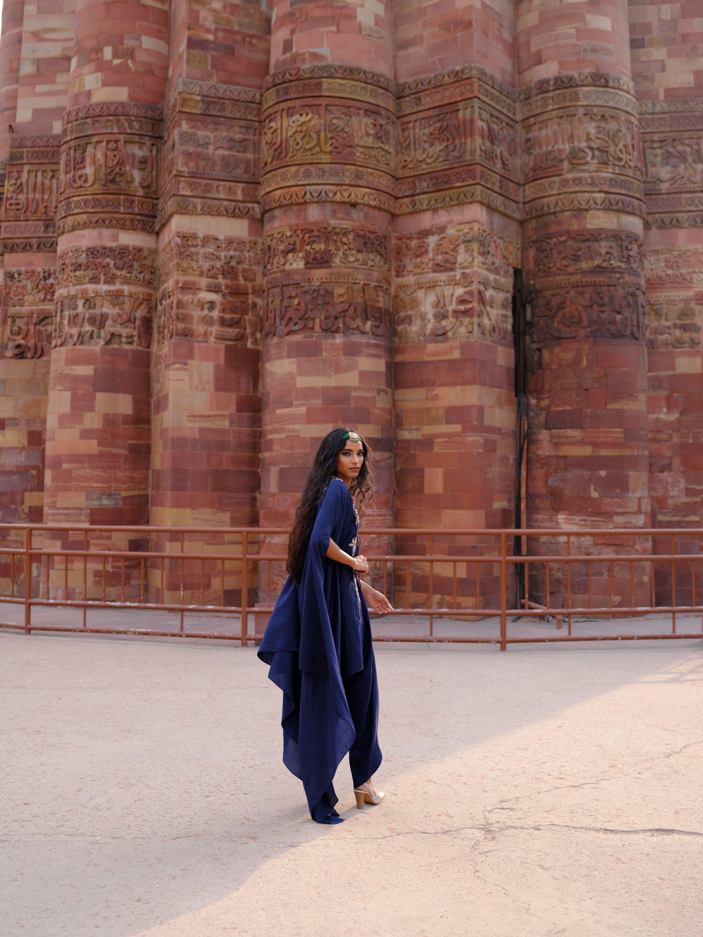 Featuring a cape in silk base with  zardosi embroidery