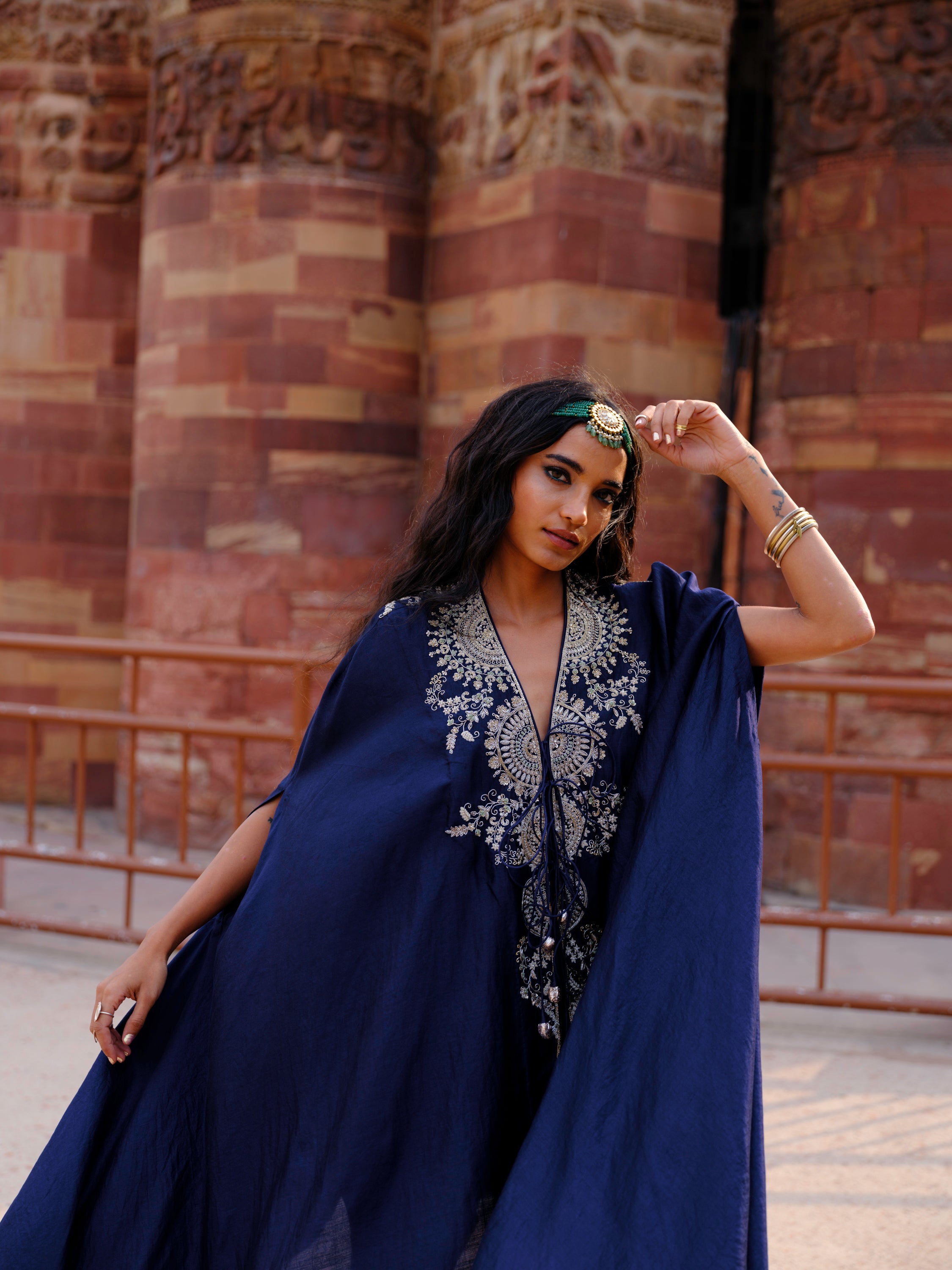 Featuring a cape in silk base with  zardosi embroidery