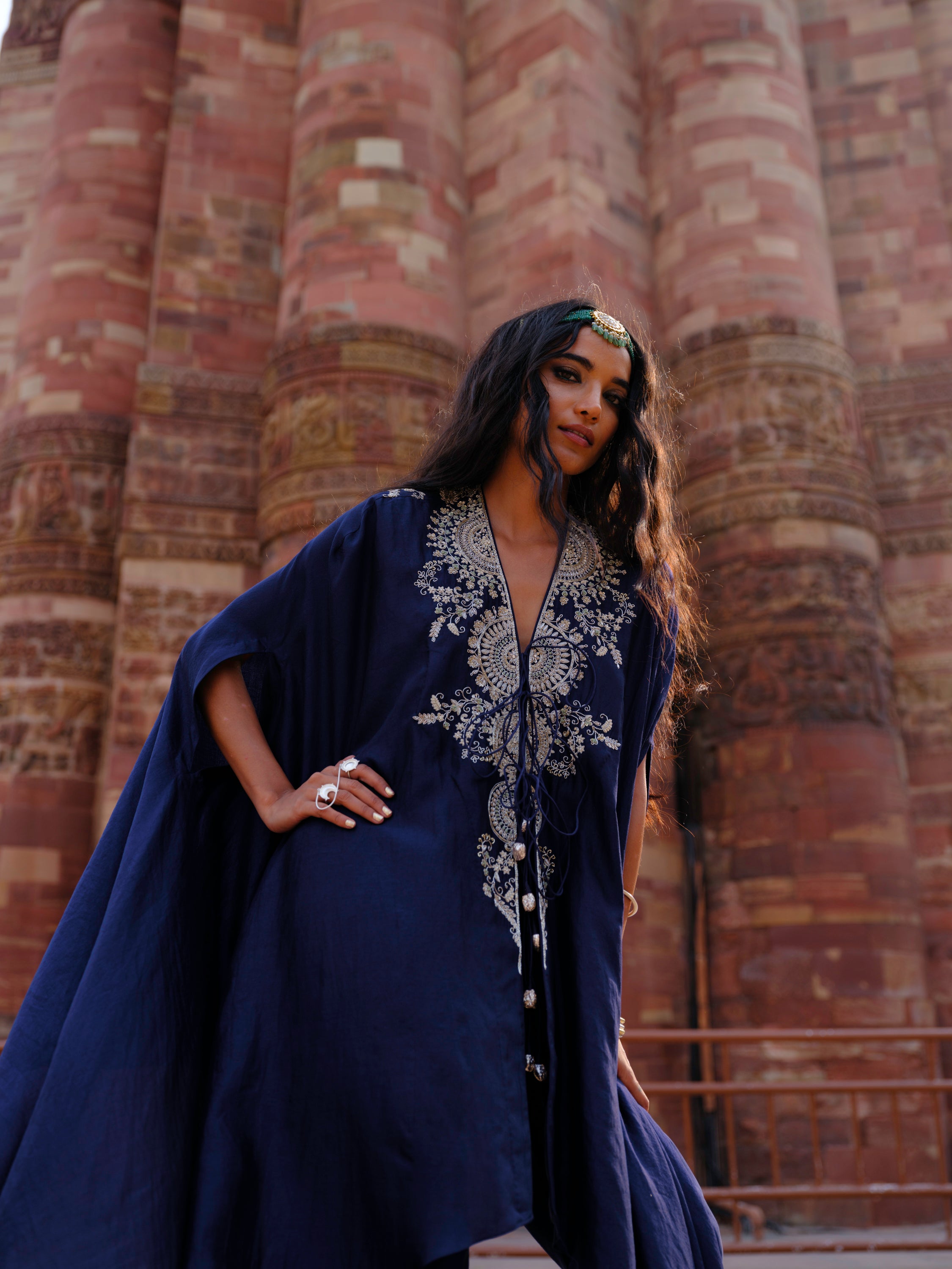 Featuring a cape in silk base with  zardosi embroidery