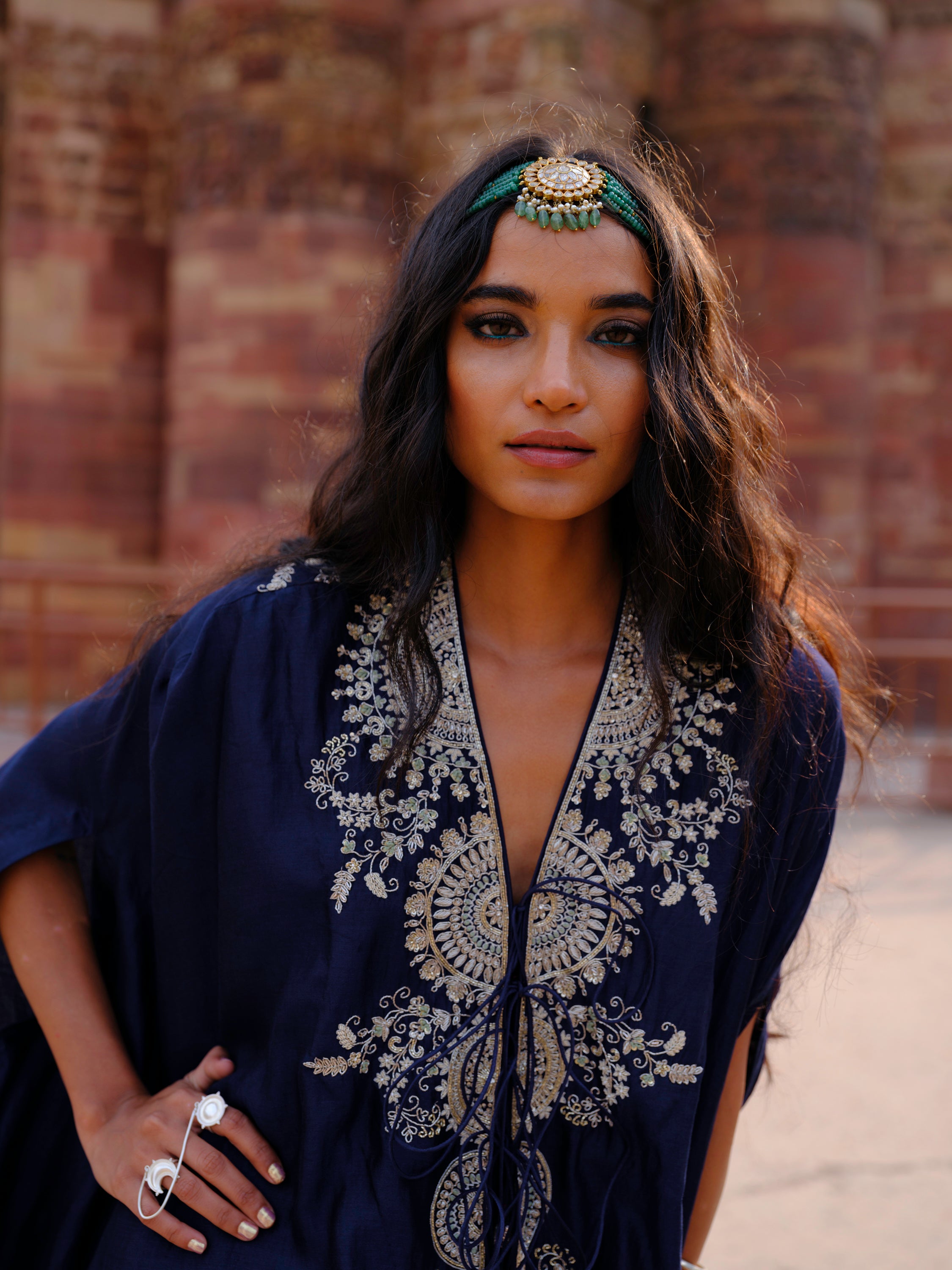 Featuring a cape in silk base with  zardosi embroidery