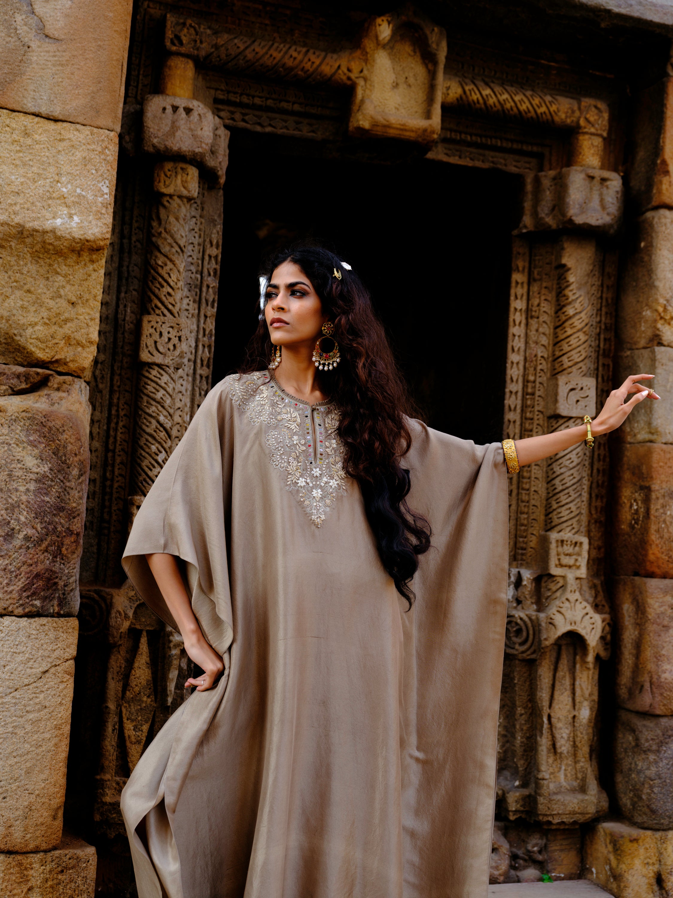 Featuring a kaftan in silk base with zardosi embroidery.