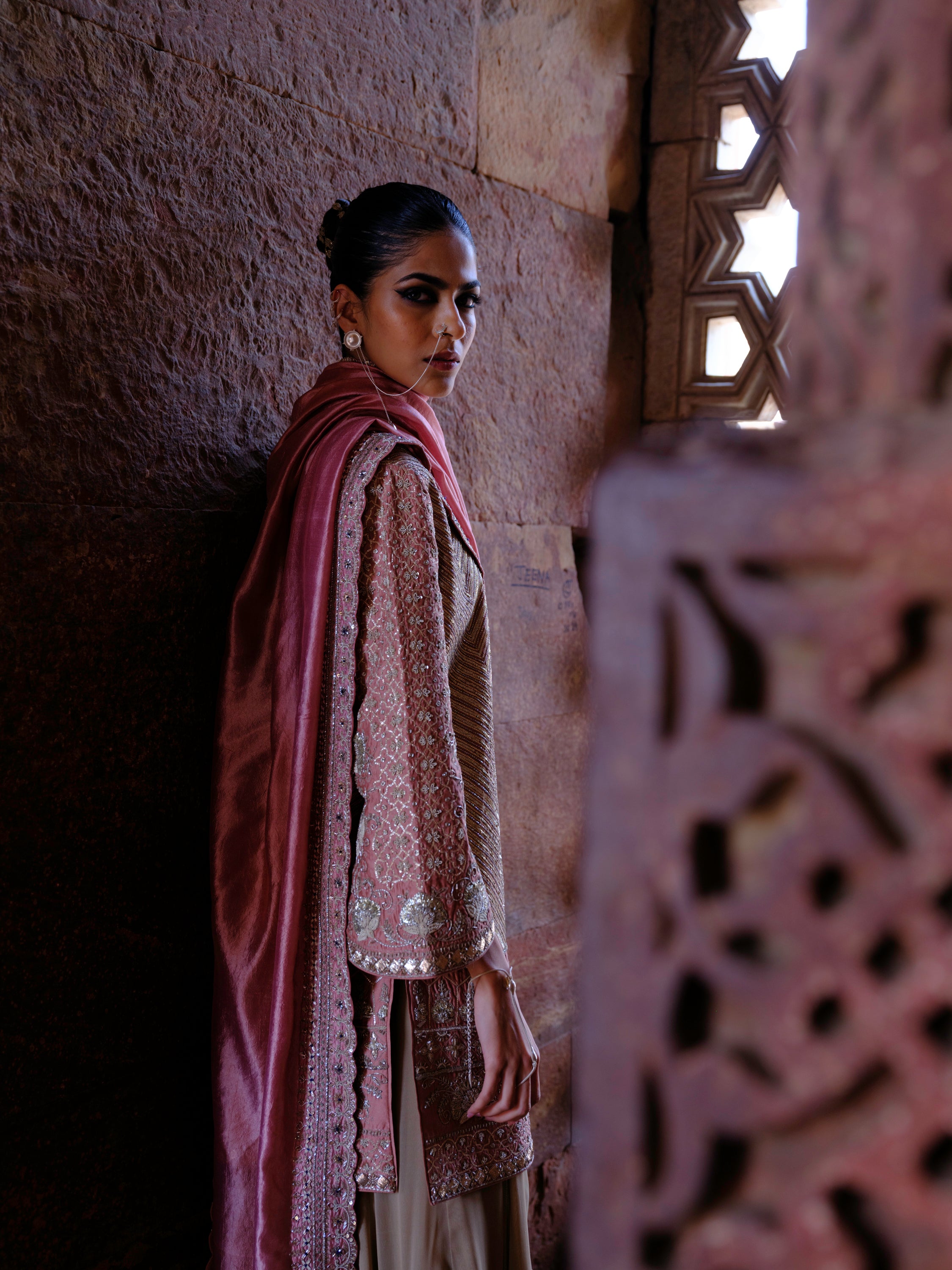 Featuring a tuinc in silk base with gotta zardosi embroidery.