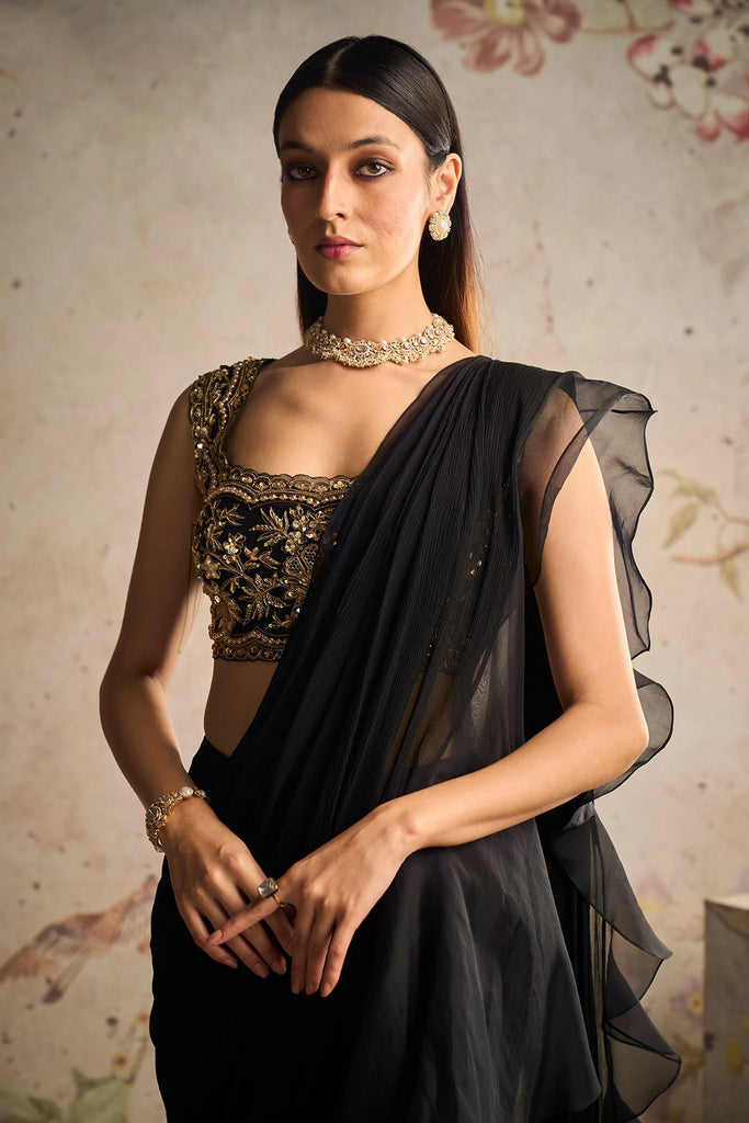 Black saree with heavy border | Saree trends, Saree designs party wear,  Western dresses