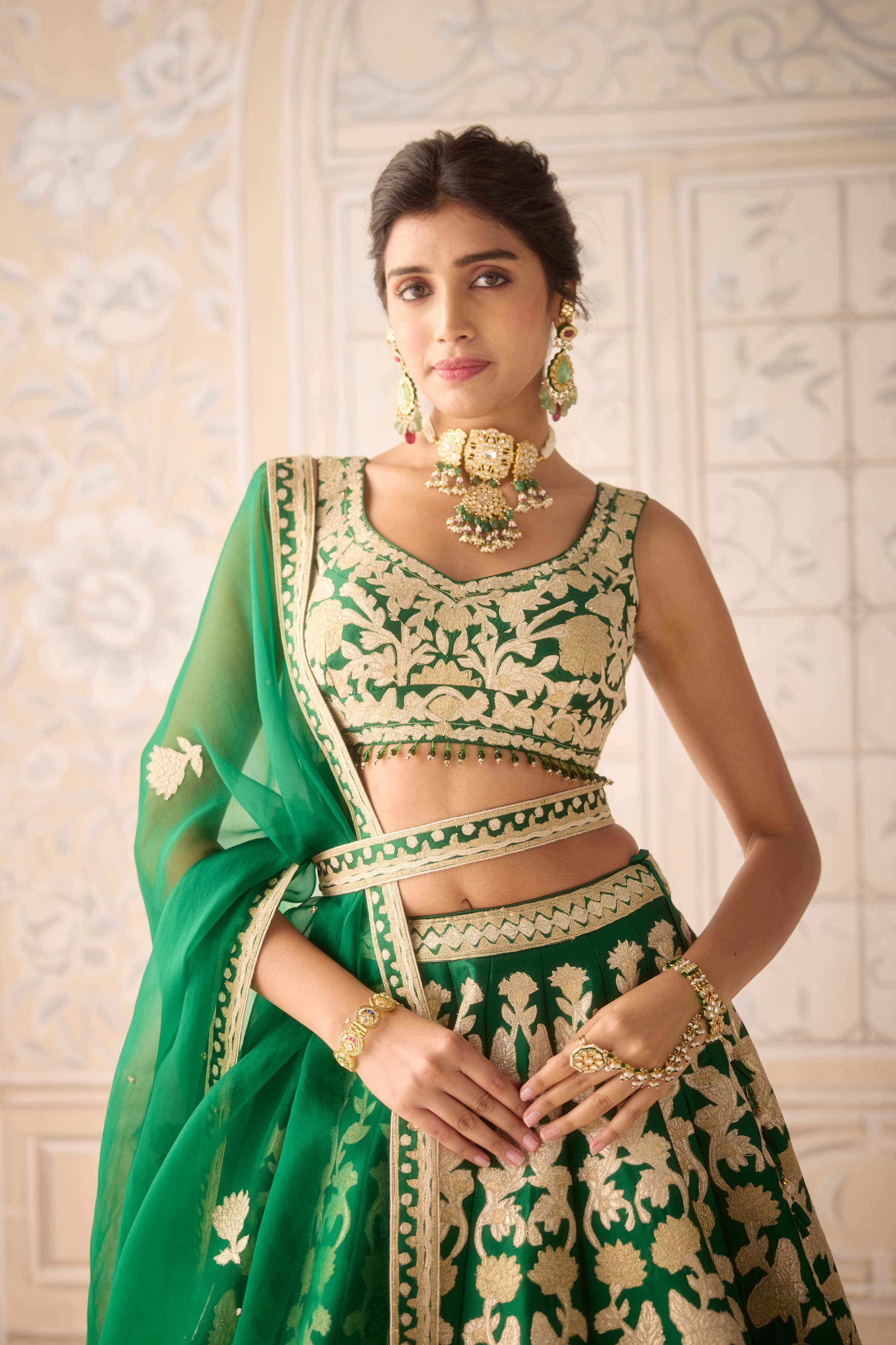 Raw silk dark green gold applique embroidered lehenga set with organza dupatta