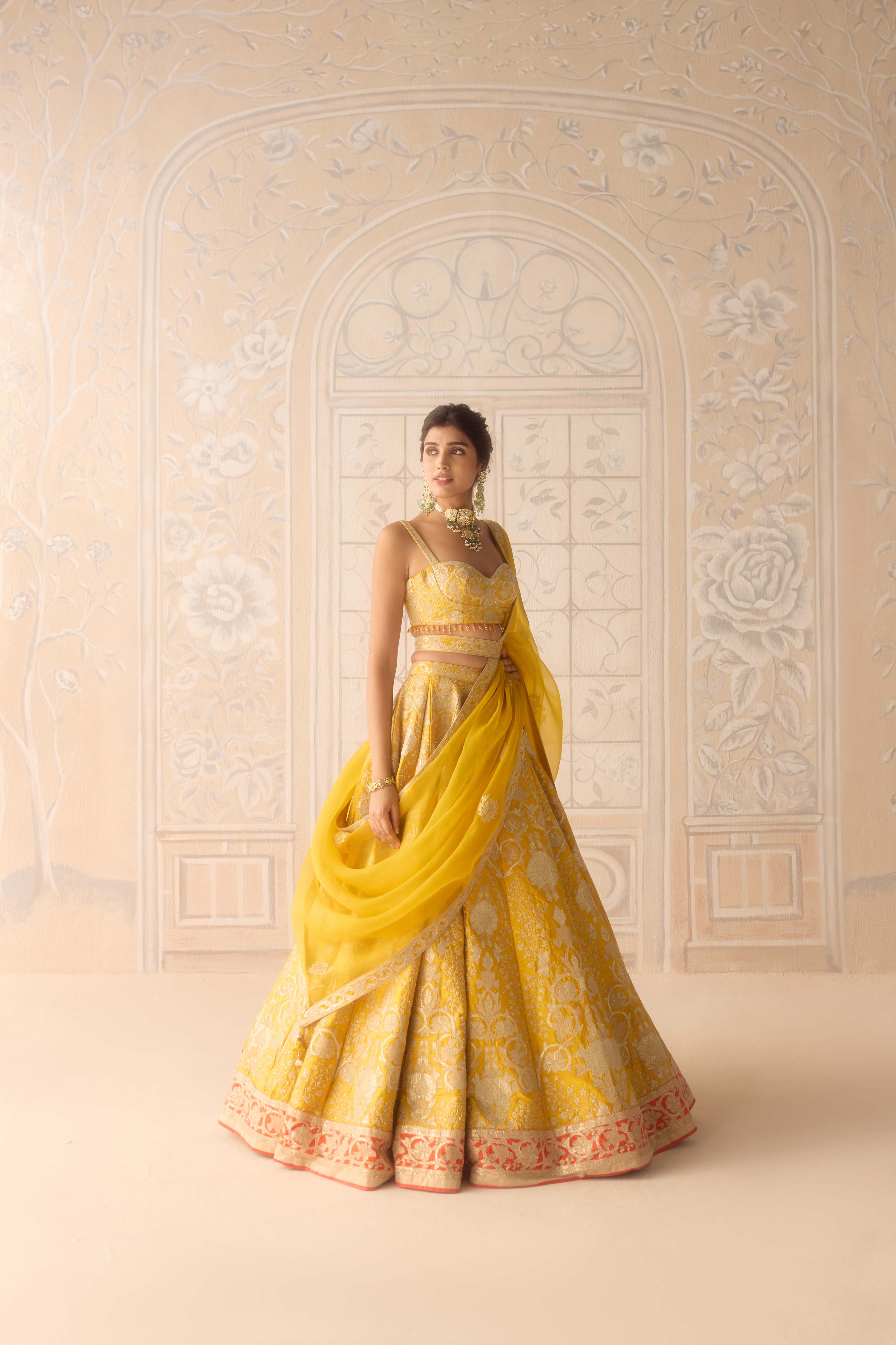Raw silk dandelion yellow gold applique and thread embroidered lehenga set with organza dupatta