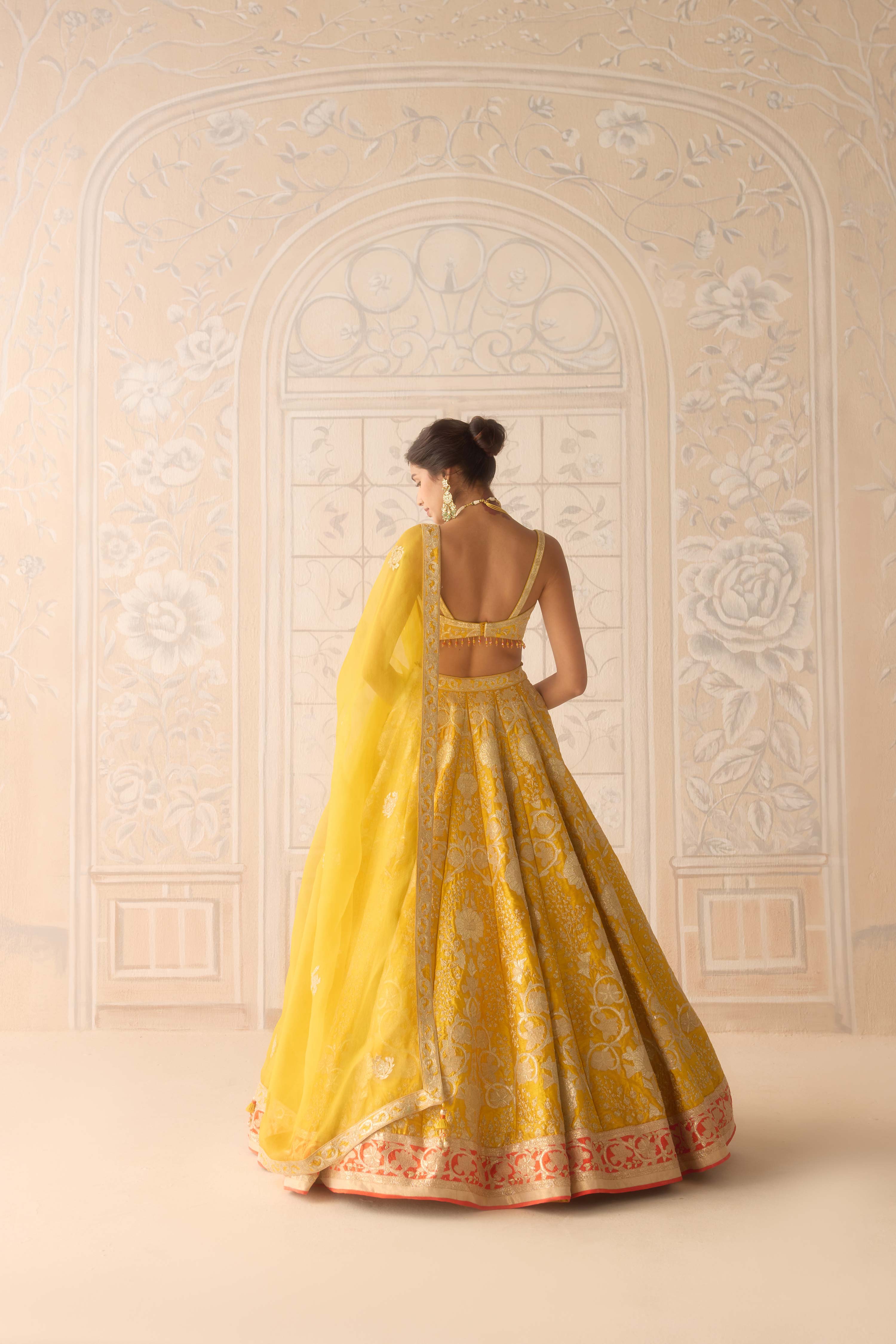Raw silk dandelion yellow gold applique and thread embroidered lehenga set with organza dupatta