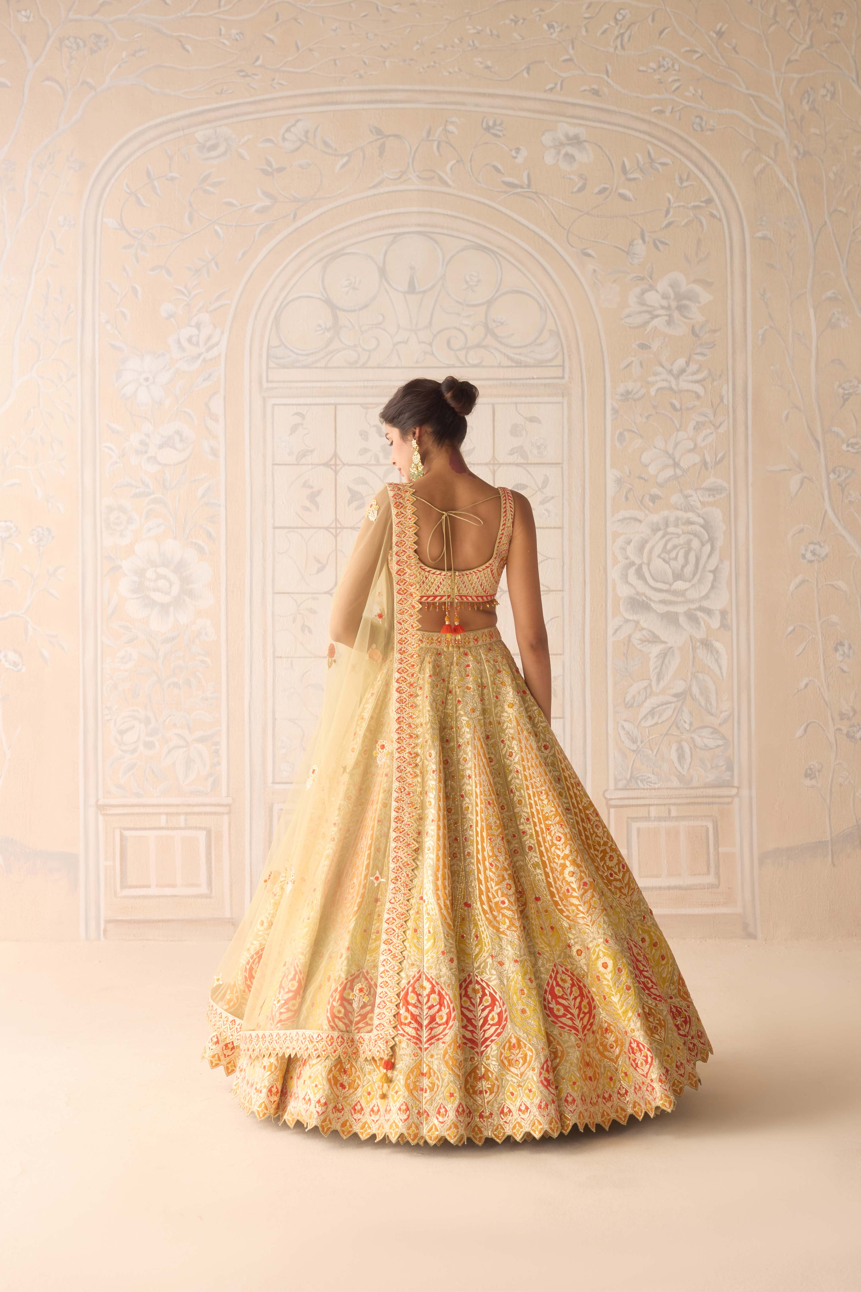 Acacia yellow multi coloured applique and gota embroidered lehenga with organza dupatta