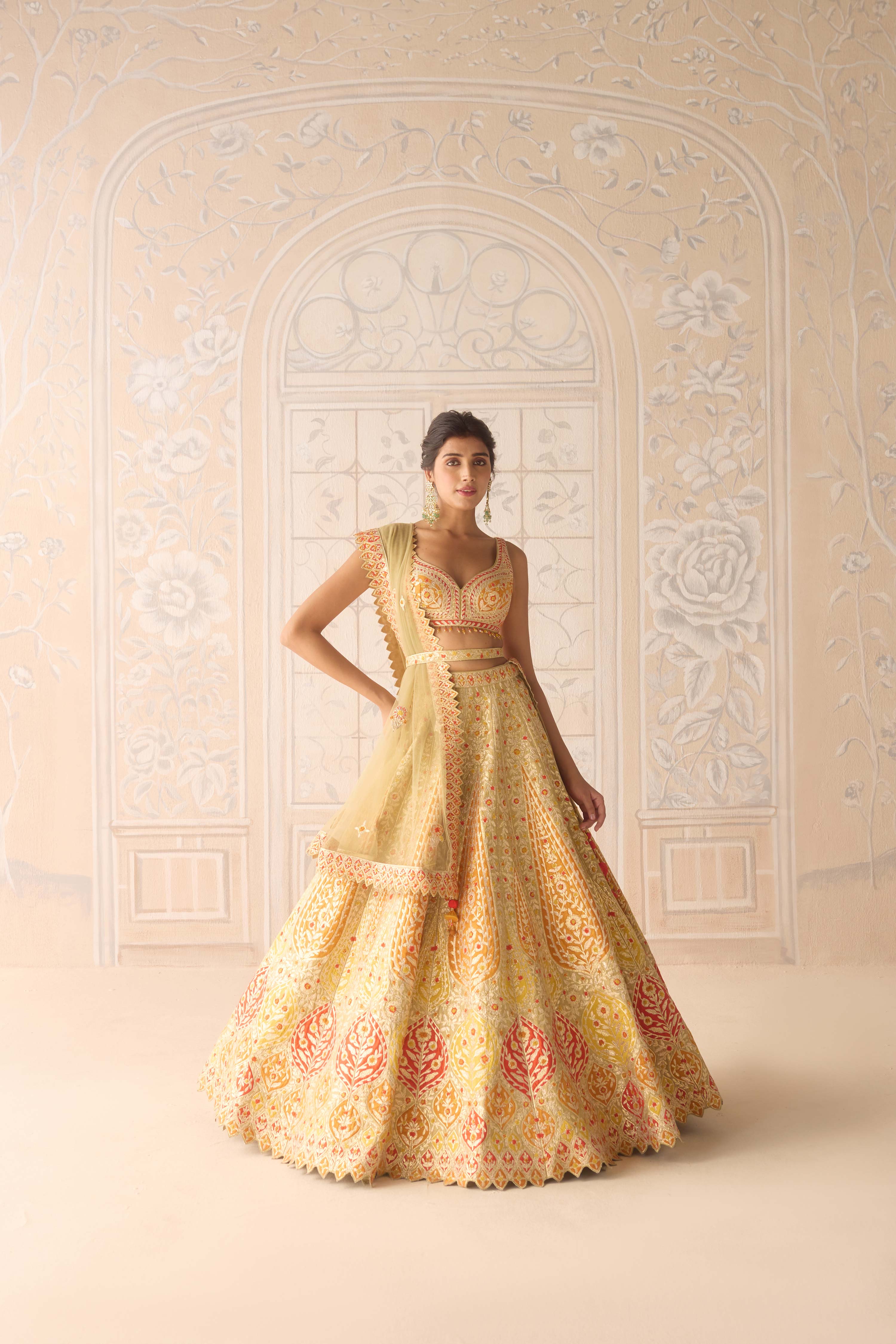 Acacia yellow multi coloured applique and gota embroidered lehenga with organza dupatta