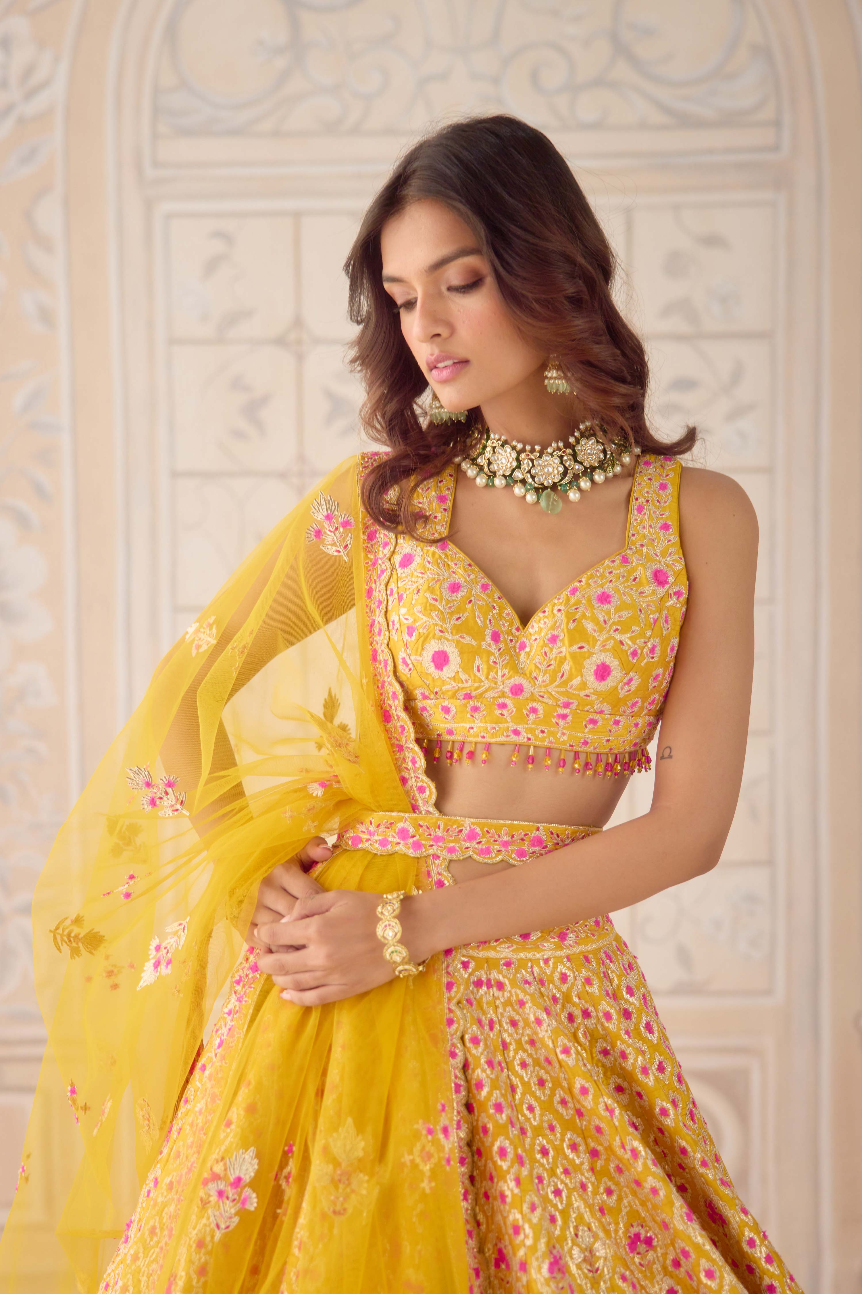 Raw silk mustard yellow gota and theread embroidered lehenga set
