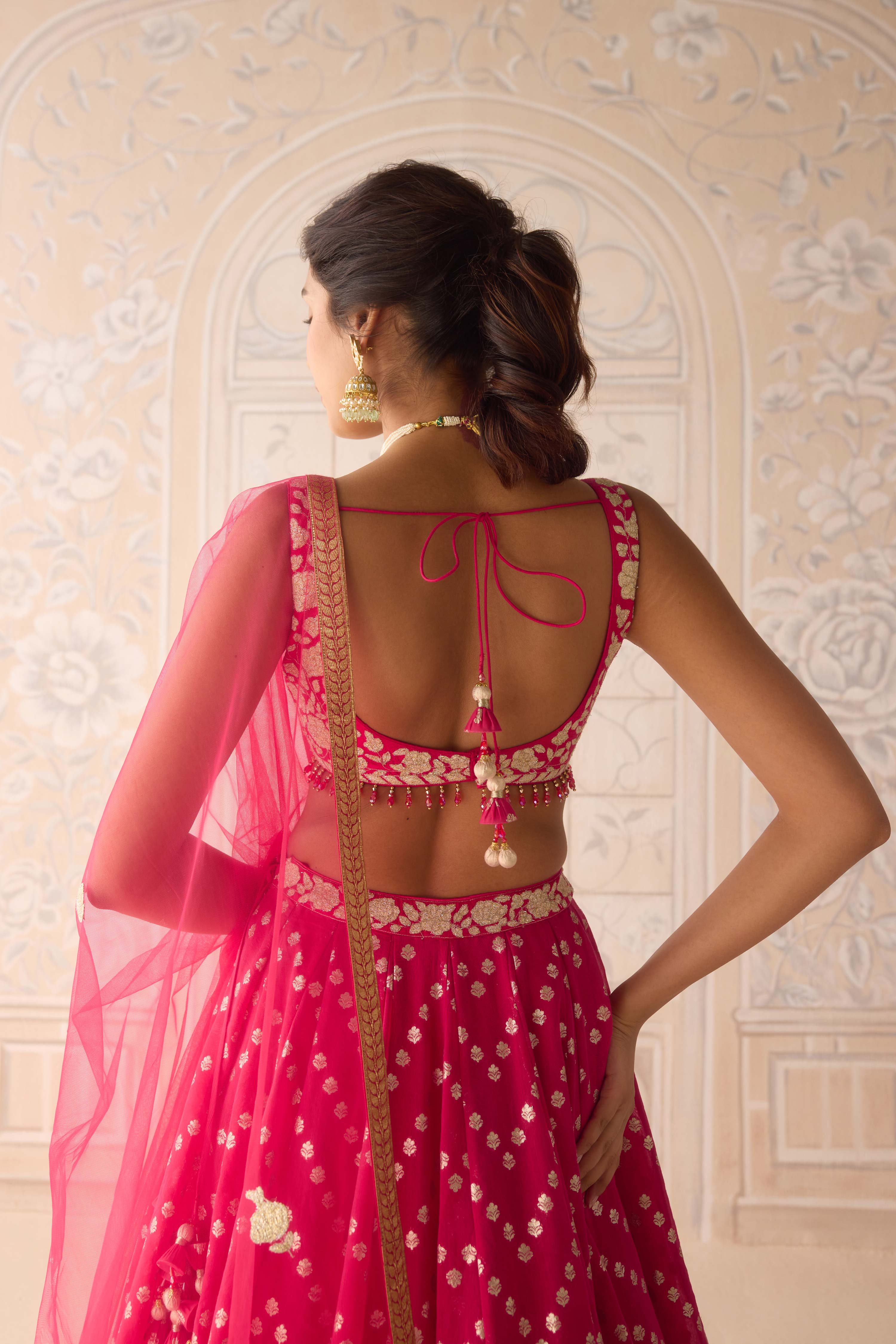 Raspberry pink lurex patch and thread embroidered chanderi jaquard lehenga with net dupatta