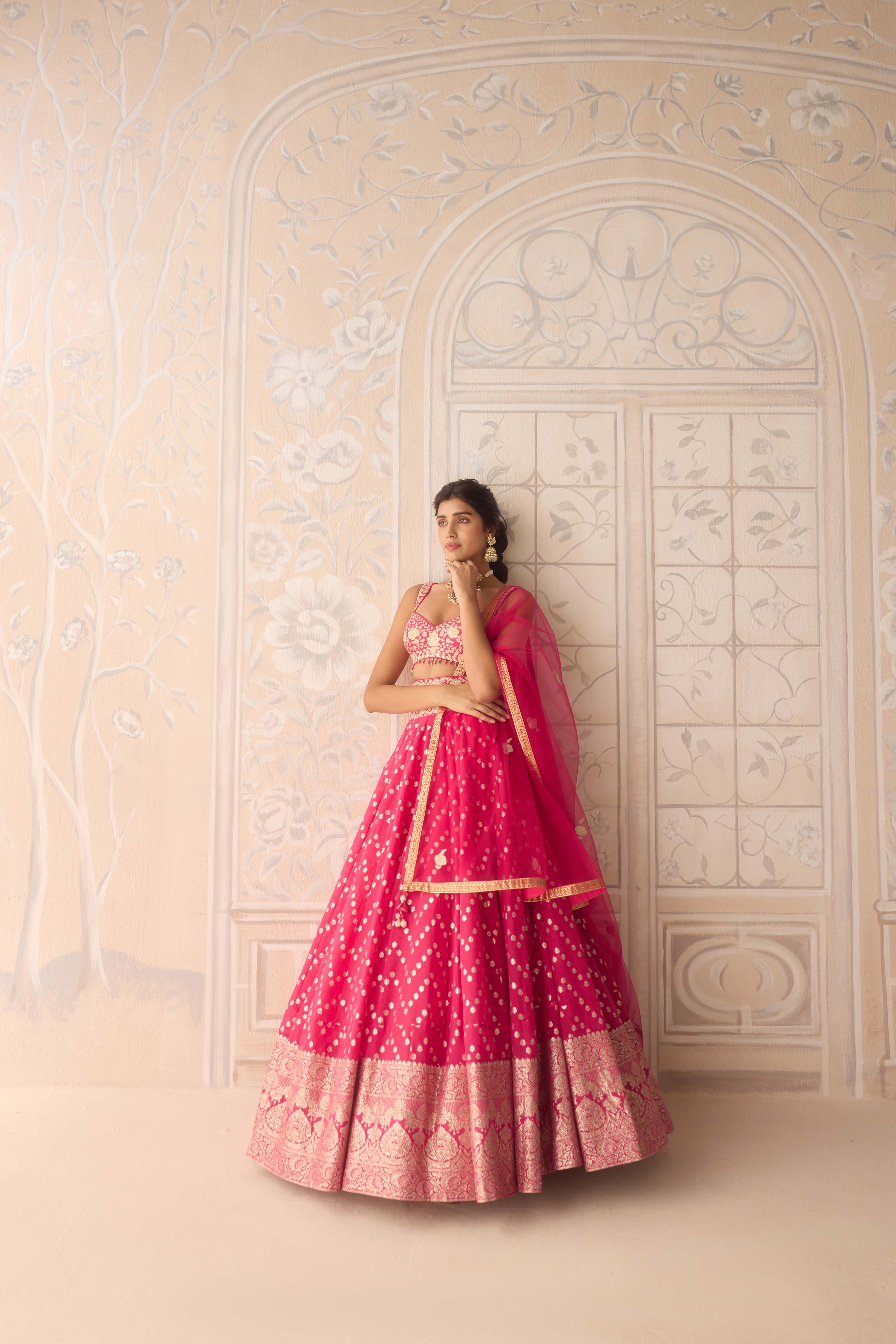 Raspberry pink lurex patch and thread embroidered chanderi jaquard lehenga with net dupatta
