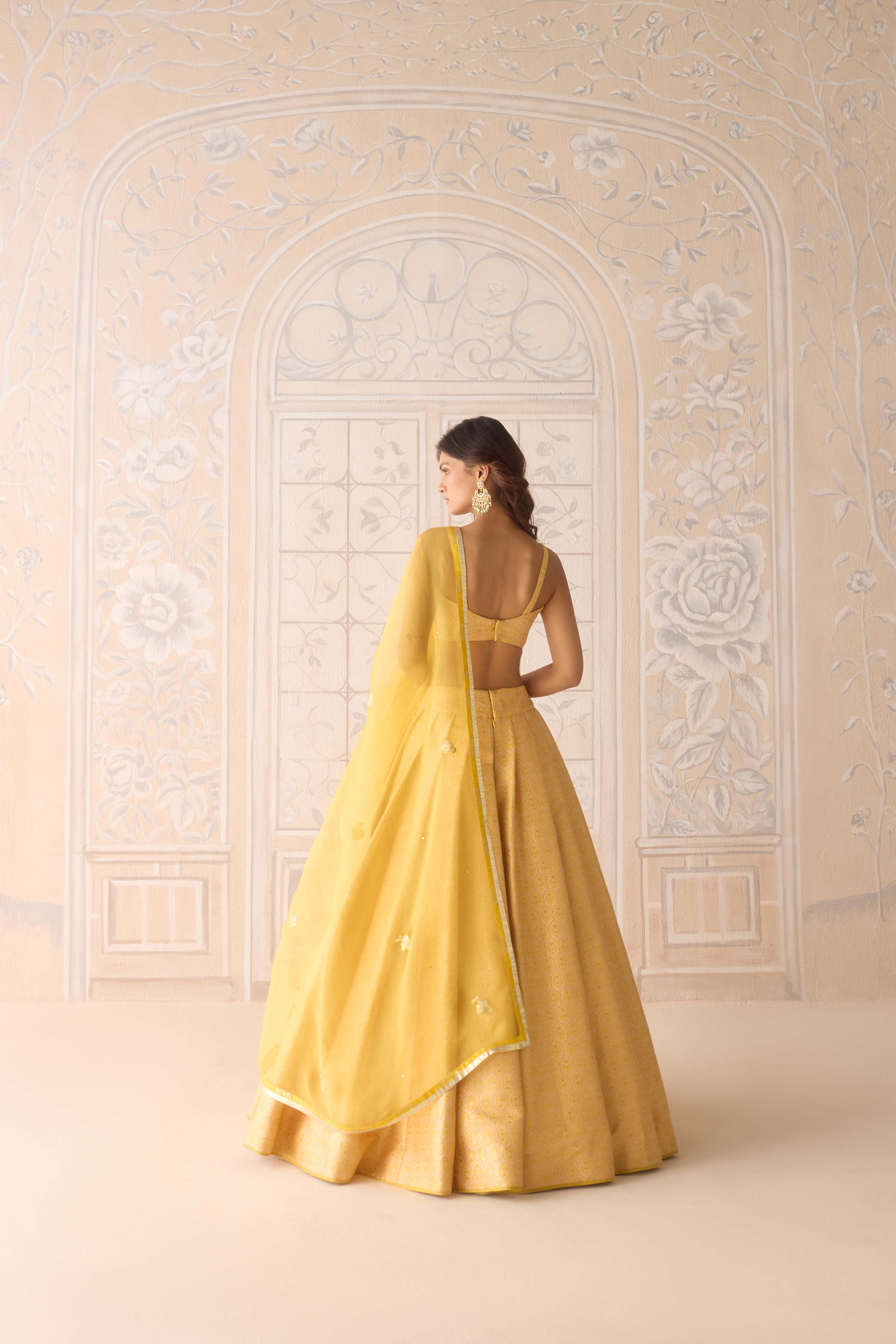Primrose yellow brocade pleated lehenga with lurex patch dupatta