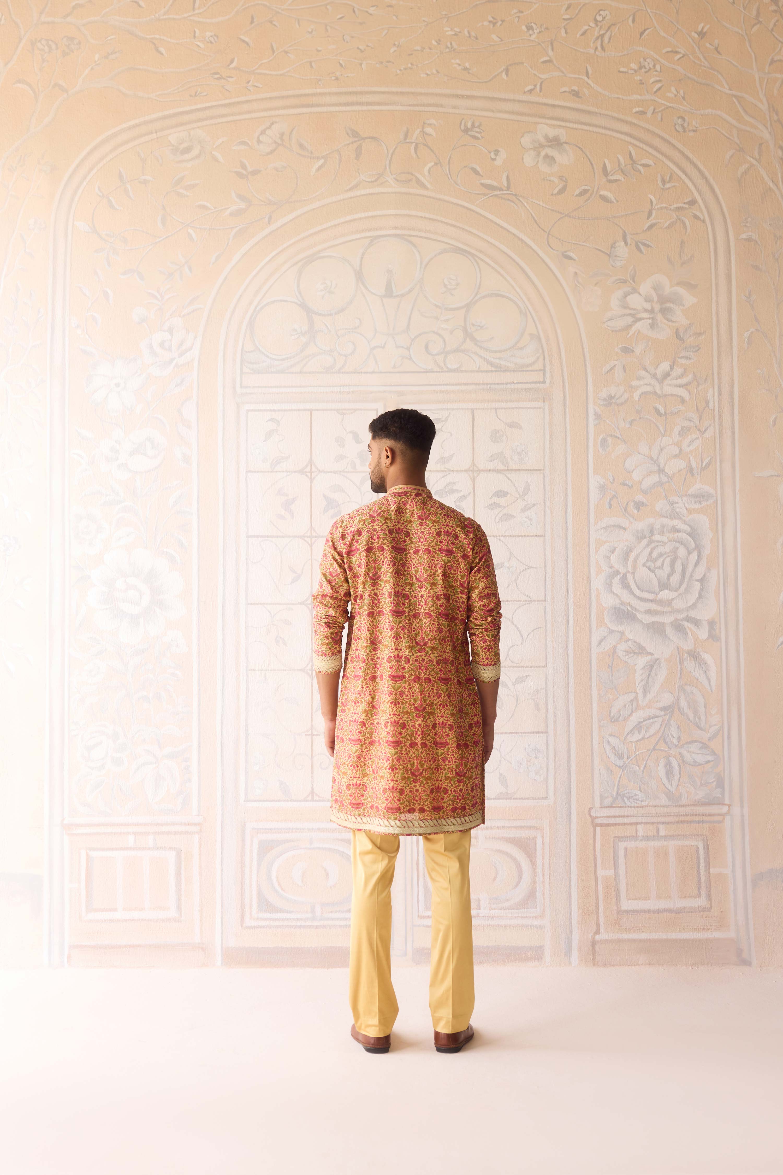 Handblock printed gold applique and thread embroidered kurta paired with embroidered raw silk waist coat
