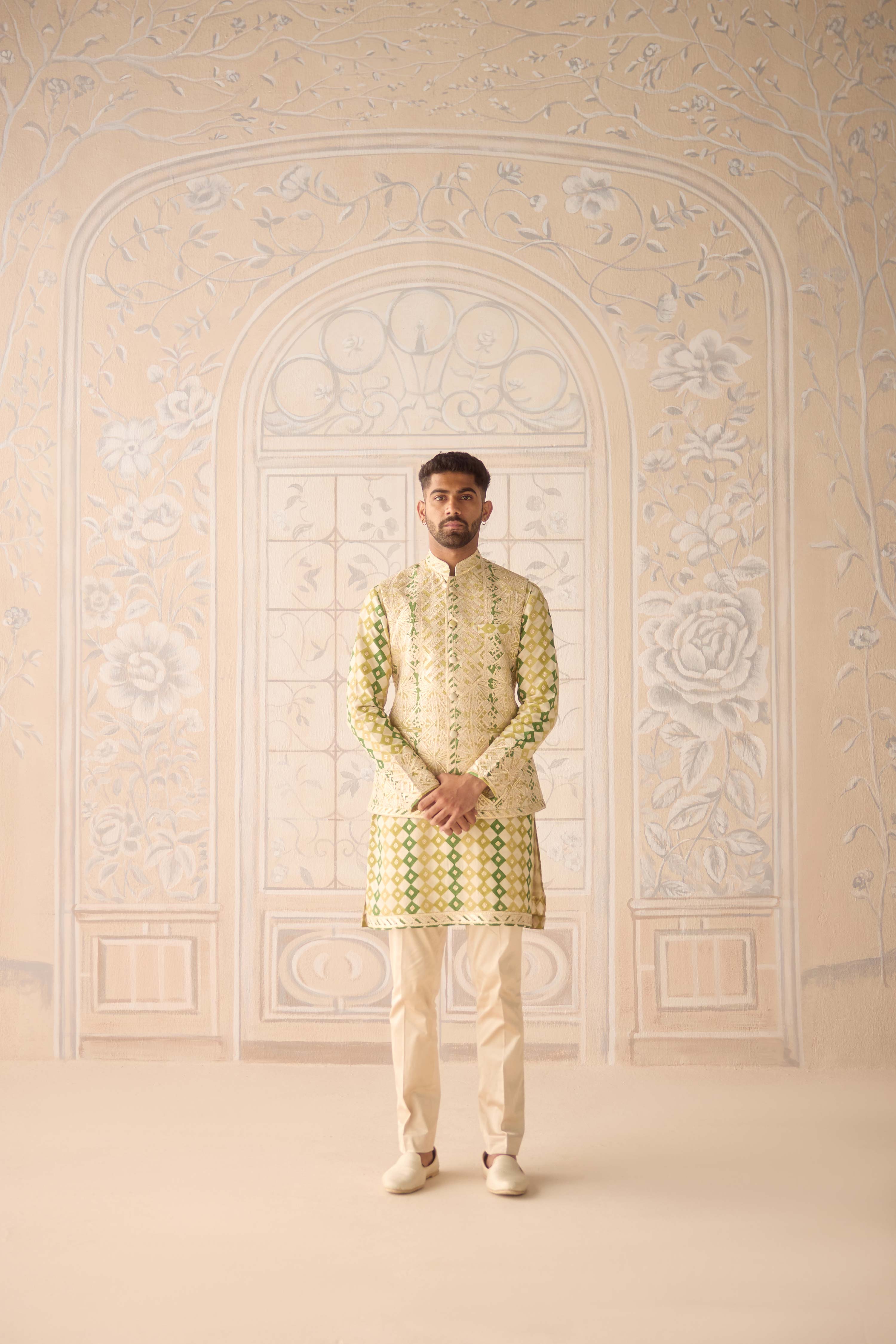 Hand block printed gold dori and thread embroidered chanderi kurta paired with fully embroidered raw silk waist coat