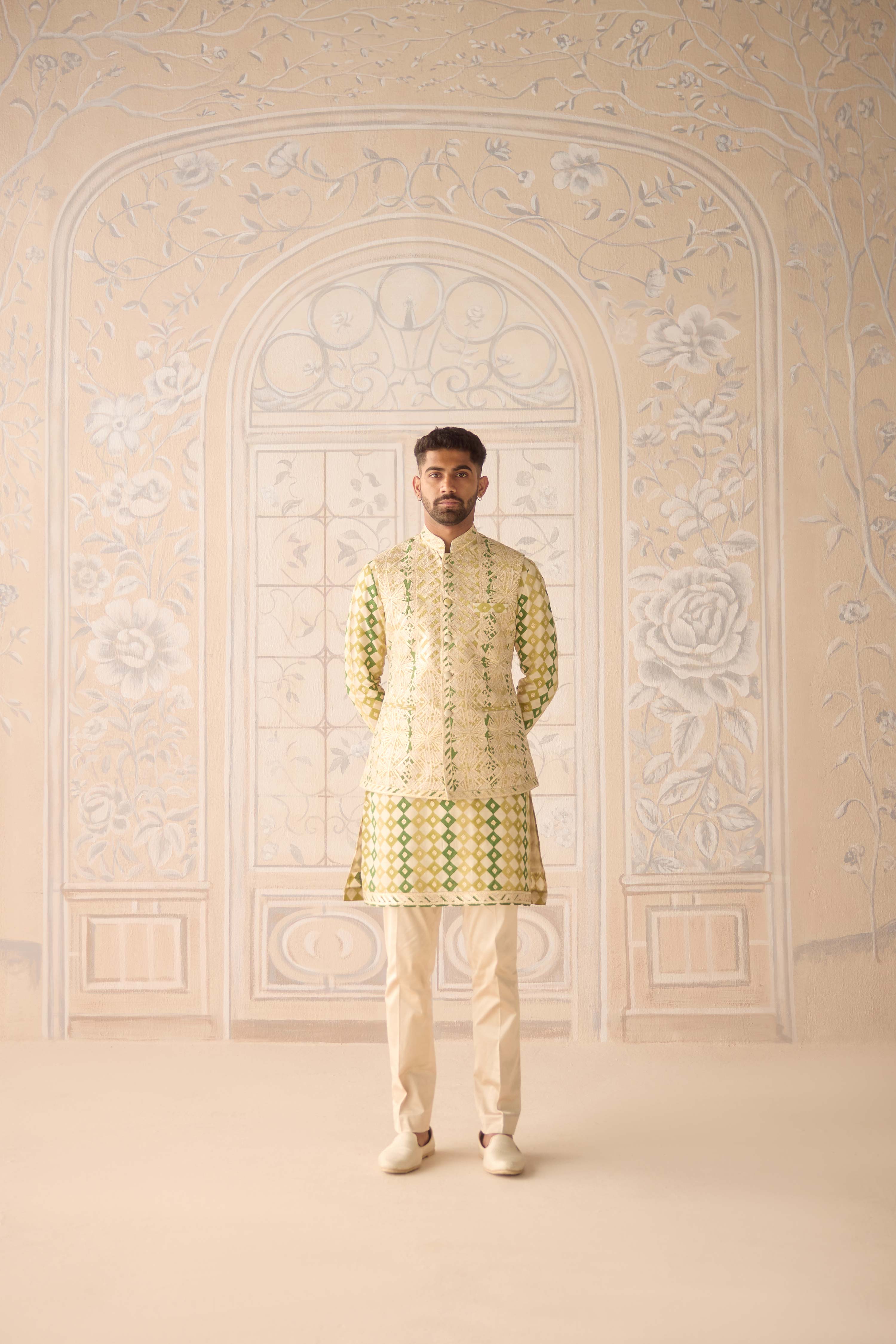 Hand block printed gold dori and thread embroidered chanderi kurta paired with fully embroidered raw silk waist coat