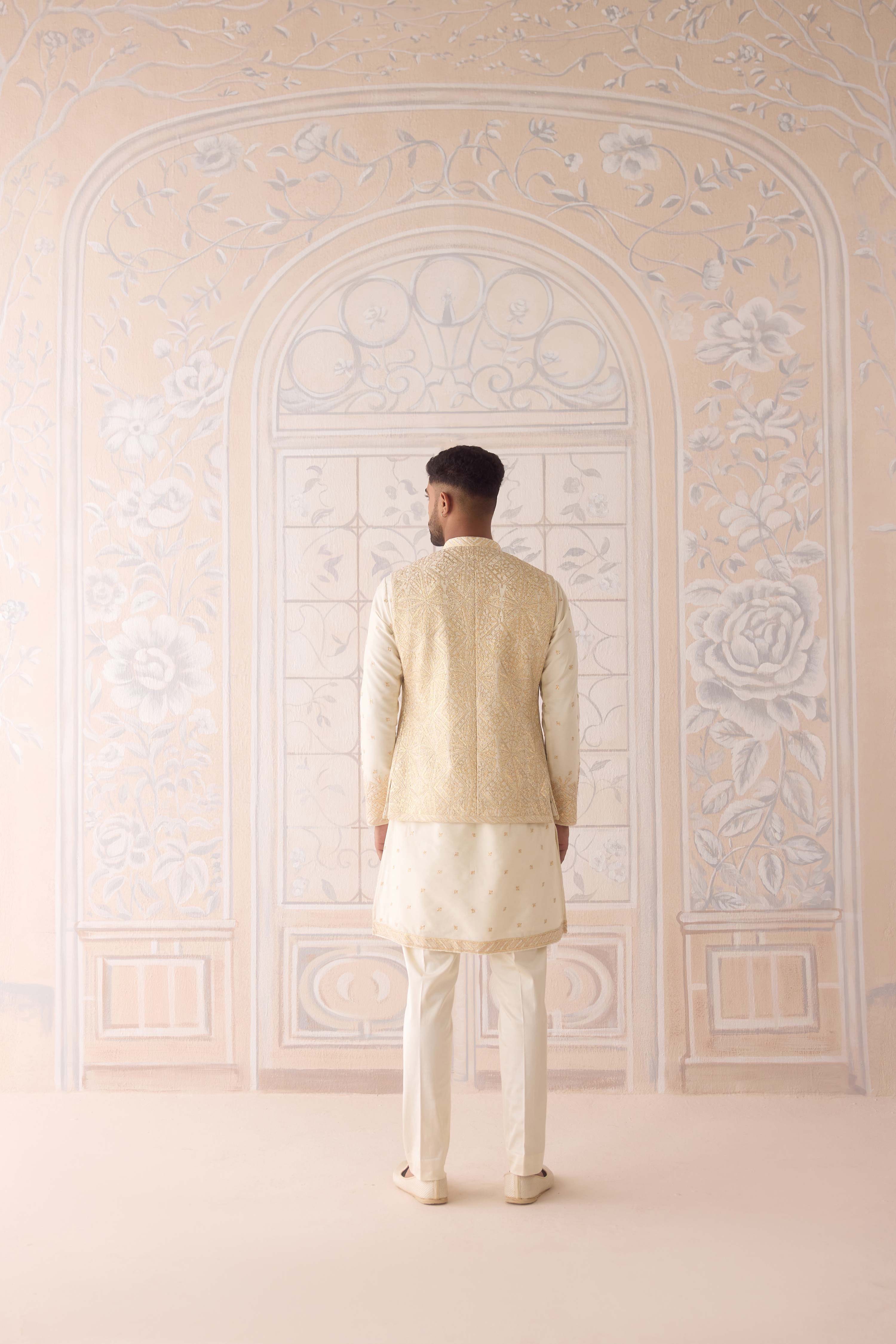 Egret ivory cotton silk gold and thread embroidereed kurta paired with fully embroidered waistcoat