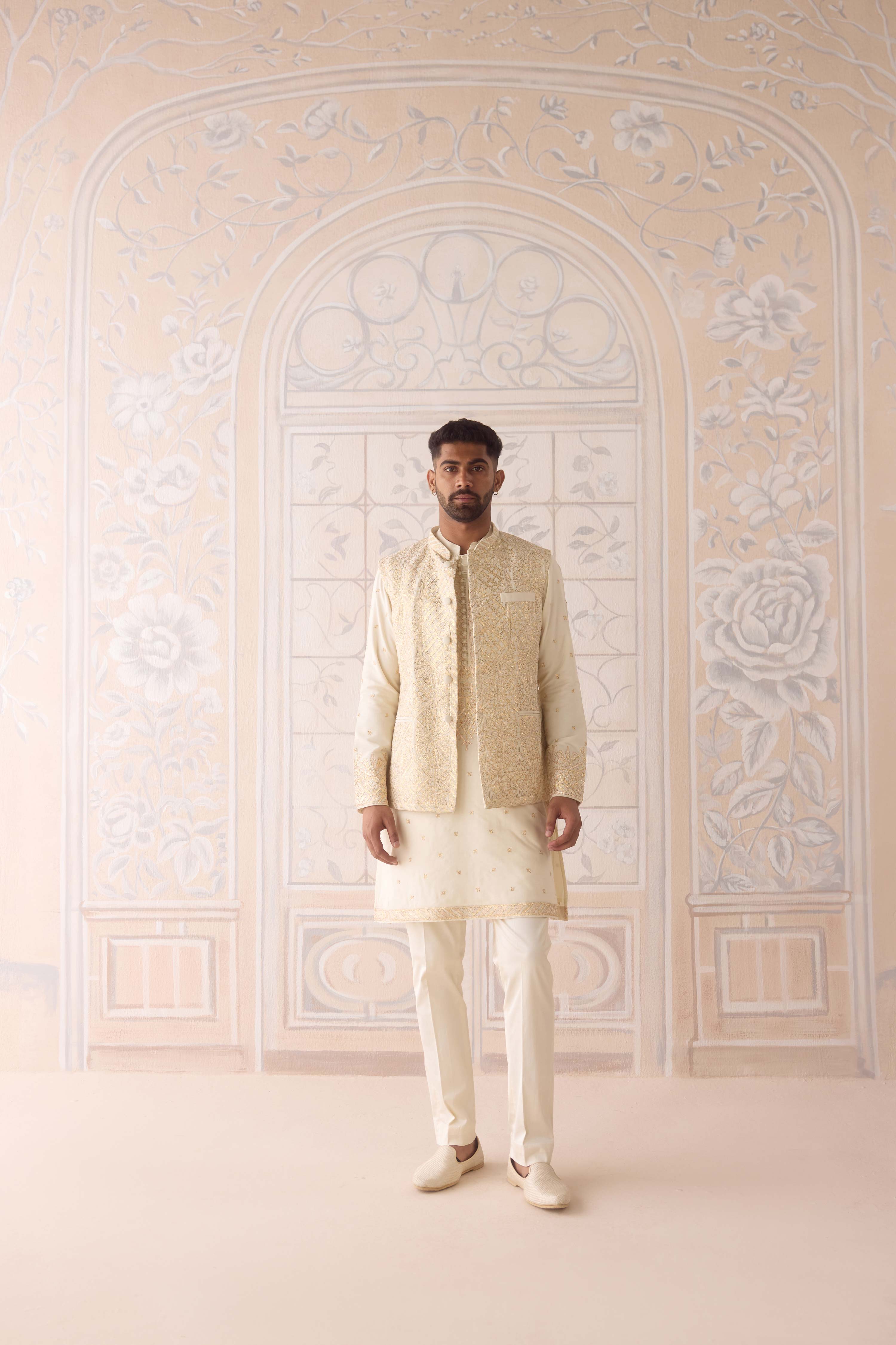 Egret ivory cotton silk gold and thread embroidereed kurta paired with fully embroidered waistcoat