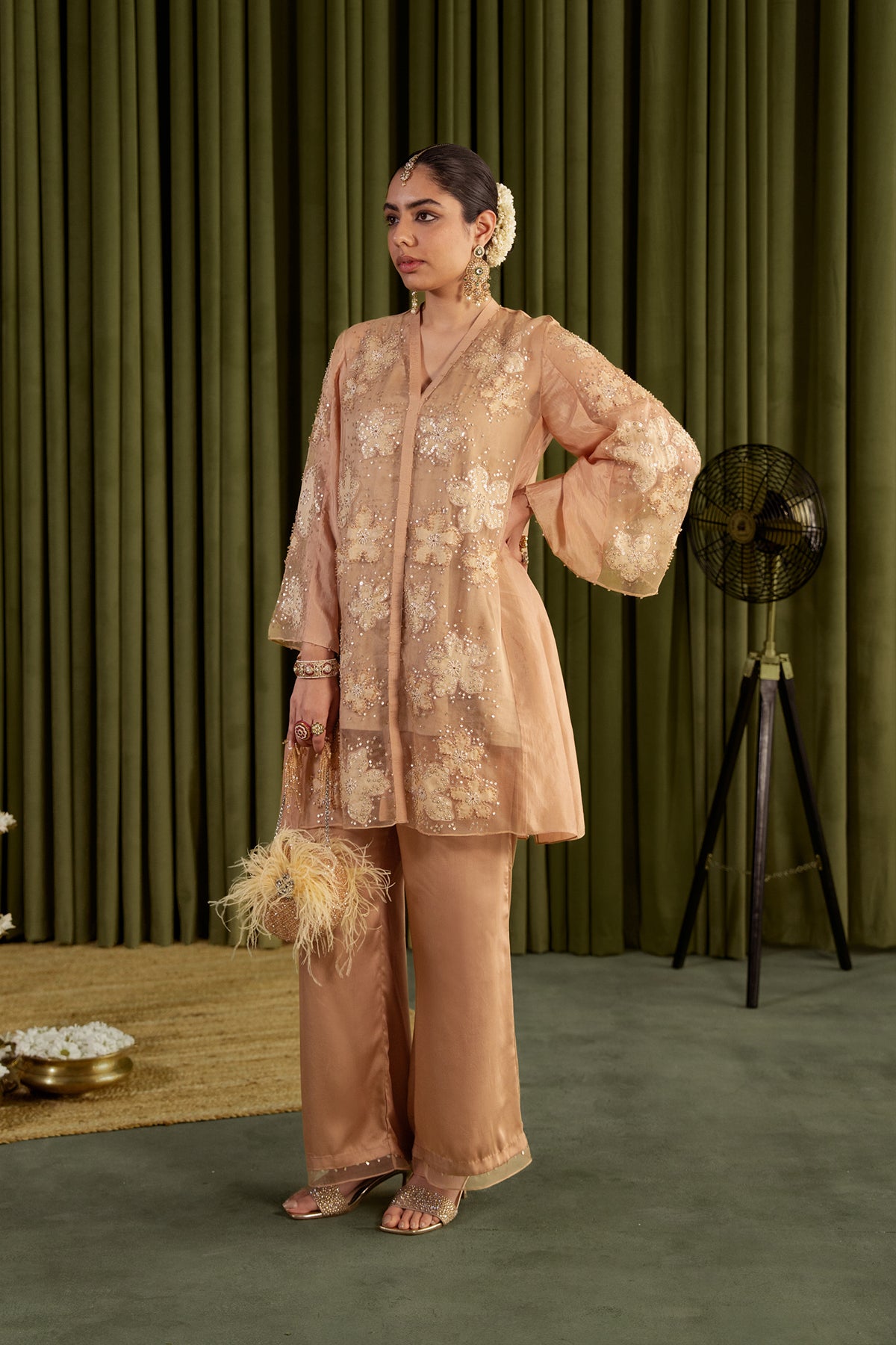 Golden beige co-ord set with embroidered floral pattern.