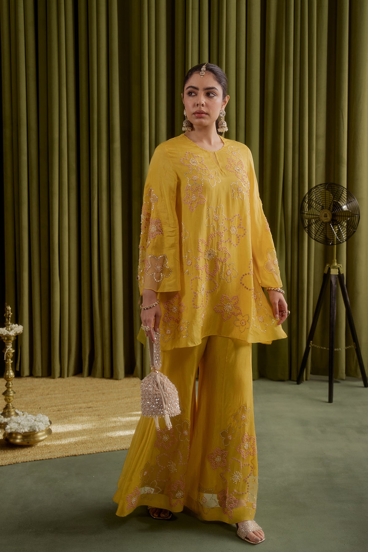 Mango sharara set with hand embroidered floral pattern.