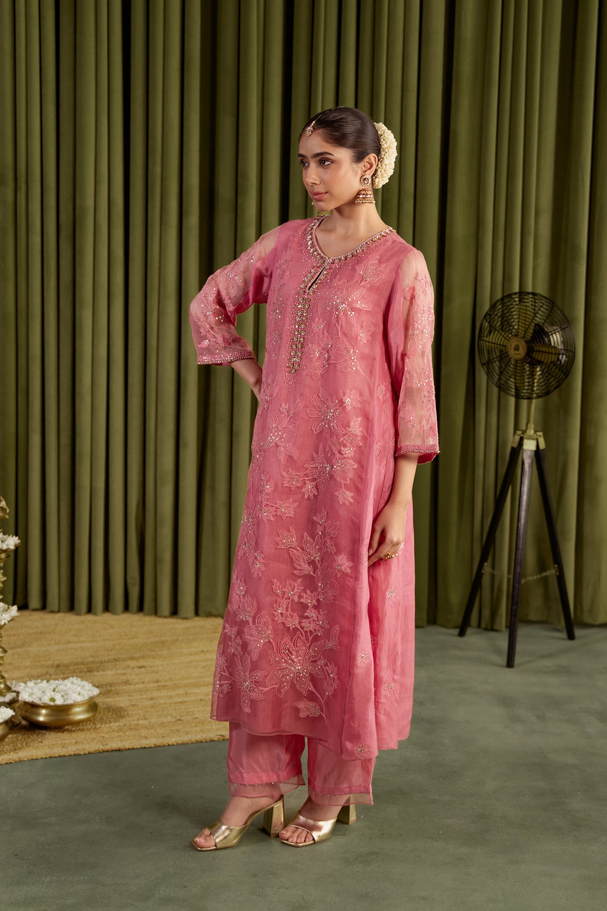 Rose pink kalidar kurta set with delicate floral embroidery.