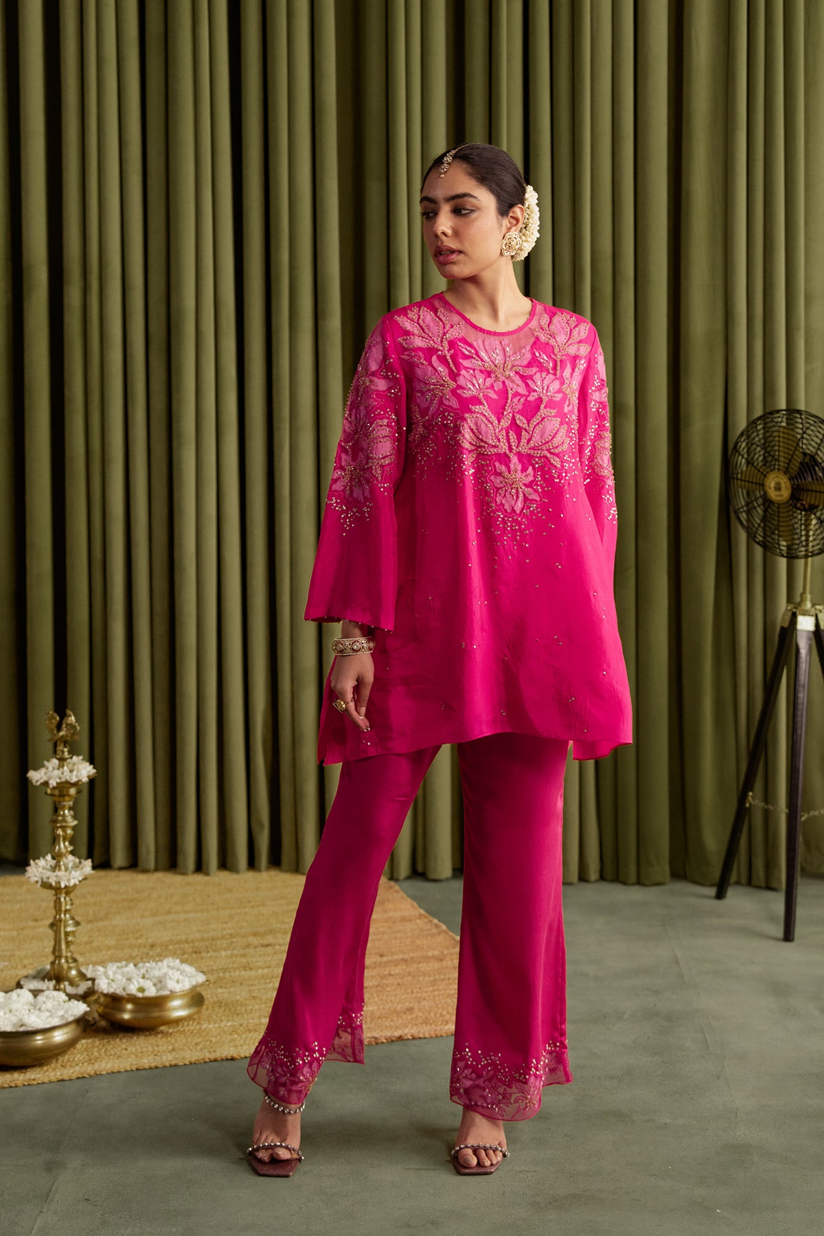 Hot pink co-ord set with embroidered magnolia flower pattern.