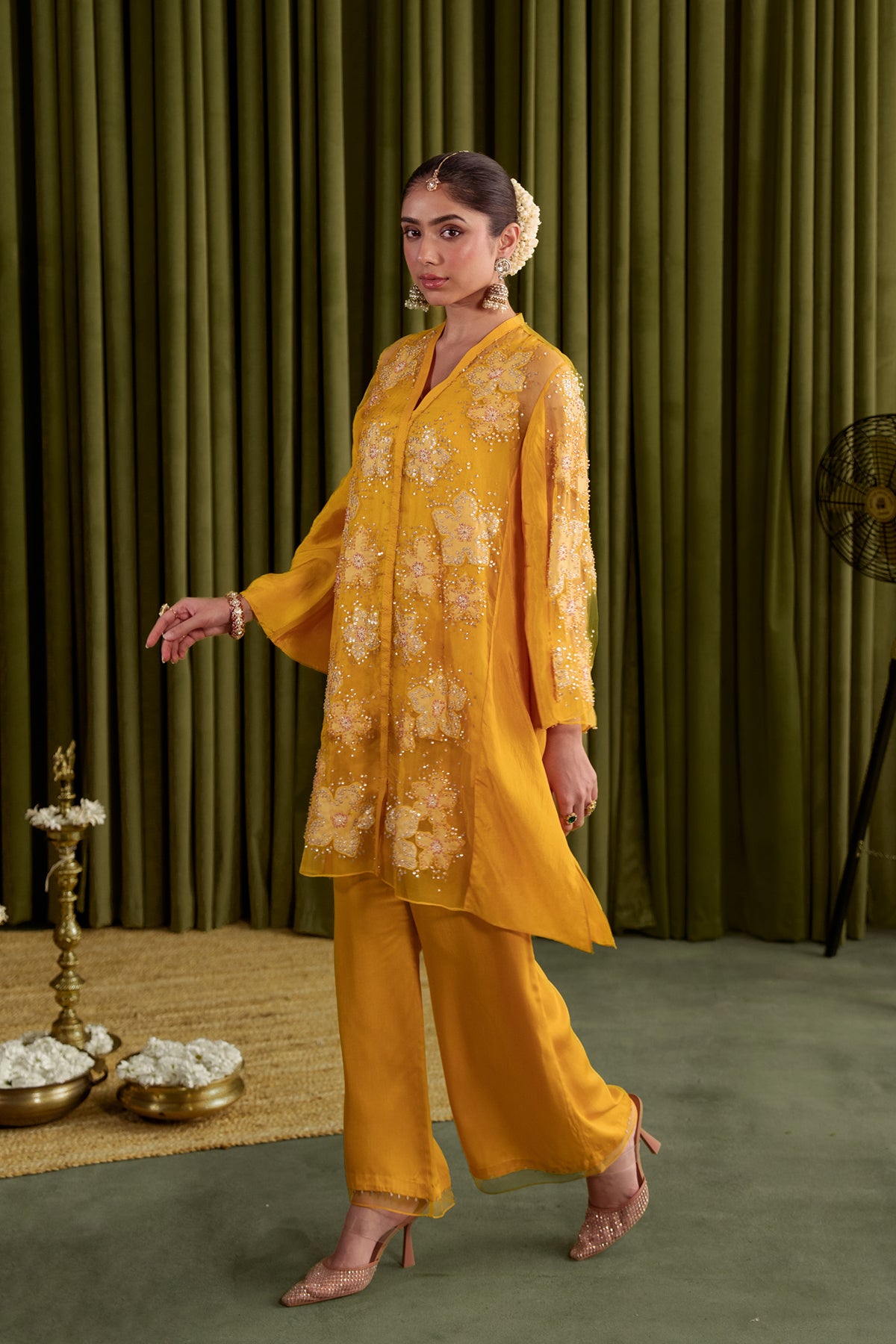 Golden beige co-ord set with embroidered floral pattern.