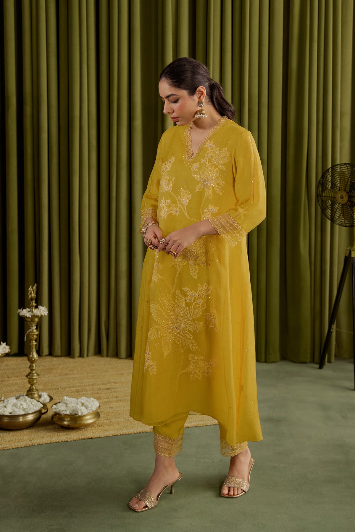 Mango kurta set with delicate floral embroidery.