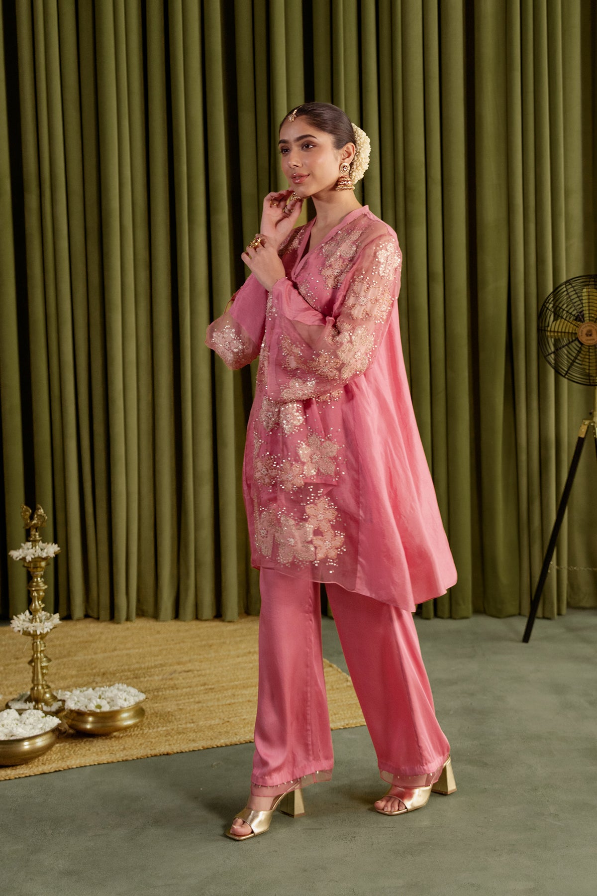 Rose pink co-ord set with embroidered floral pattern.