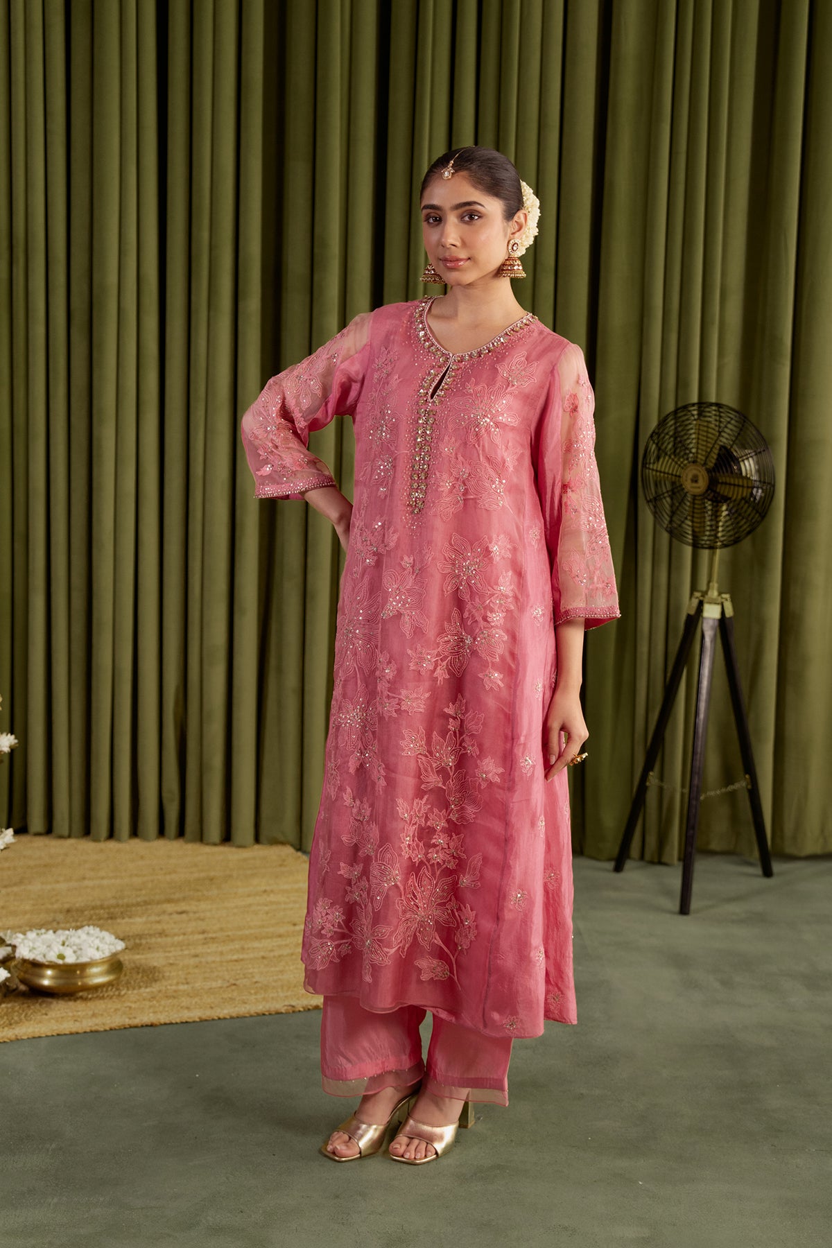 Rose pink kalidar kurta set with delicate floral embroidery.