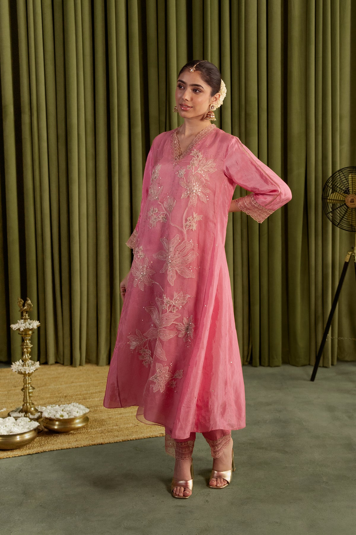 Rose pink kurta set with delicate floral embroidery.