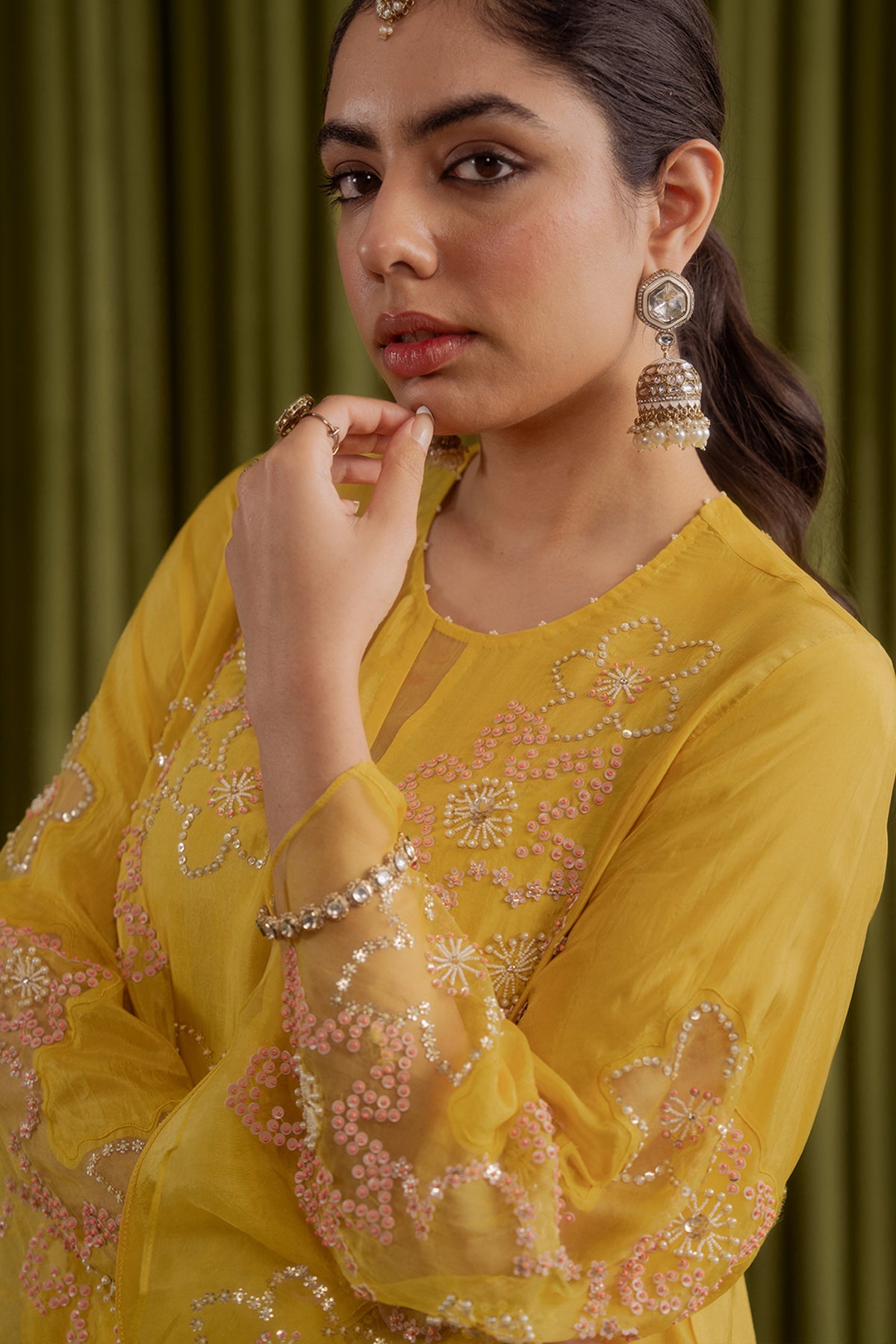 Mango sharara set with hand embroidered floral pattern.