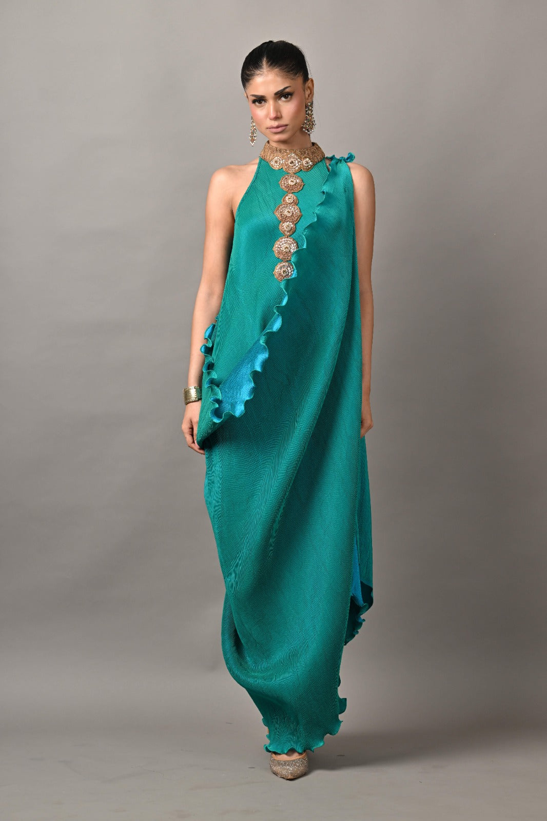Bright turquoise pleated diagonal dress with collar with moresque embroidery and pleated drape