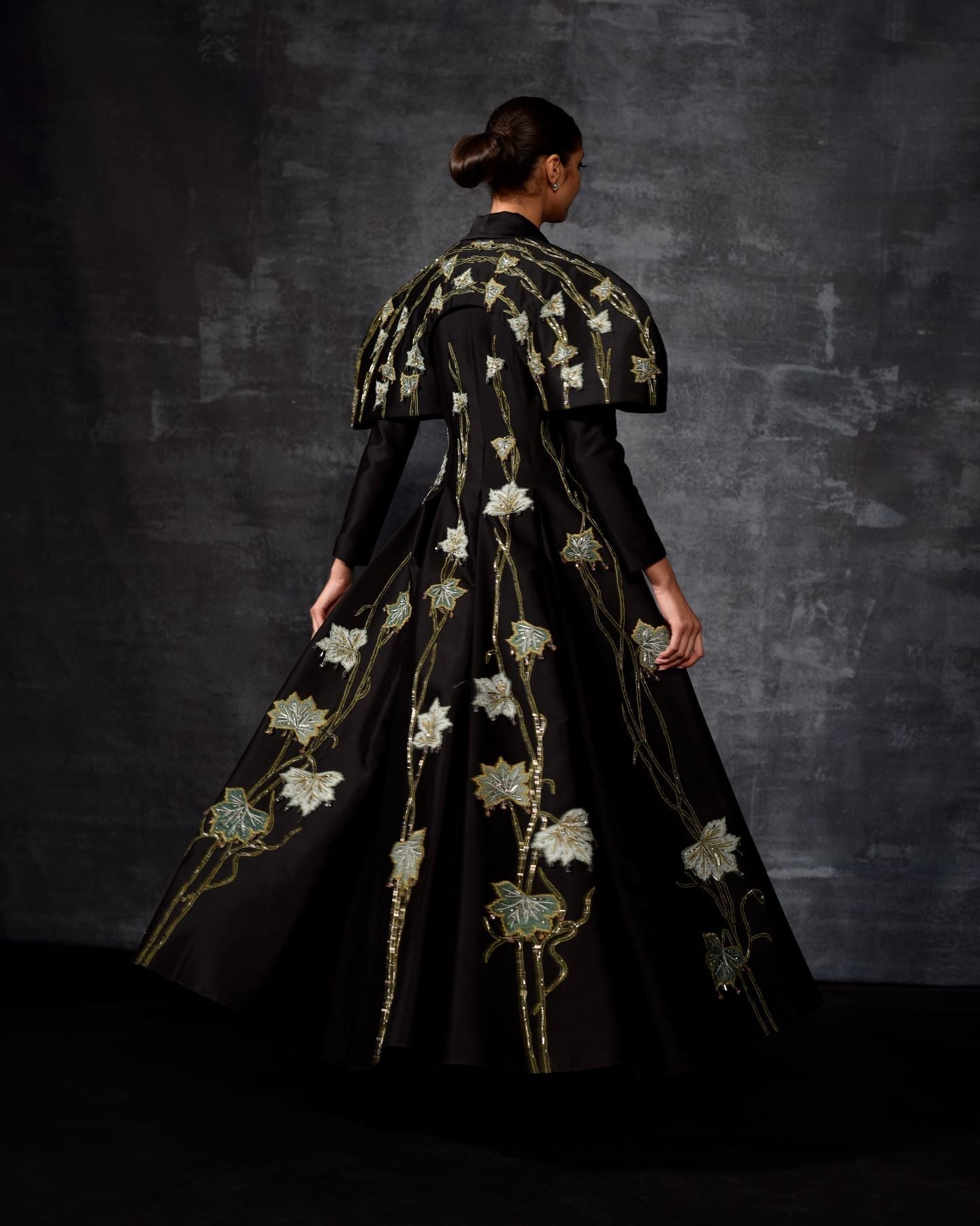https://cdn.shopify.com/s/files/1/0088/3441/6706/files/a-black-cotton-silk-fabric-floor-length-gown-with-lapel-neck-line-8695270.jpg?v=1752388639