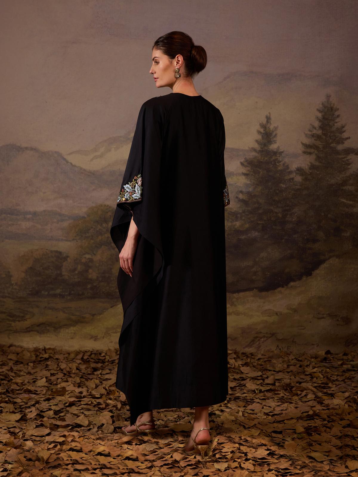 https://cdn.shopify.com/s/files/1/0088/3441/6706/files/a-comfortable-yet-elegant-black-caftan-style-dress-4111880.jpg?v=1752388607