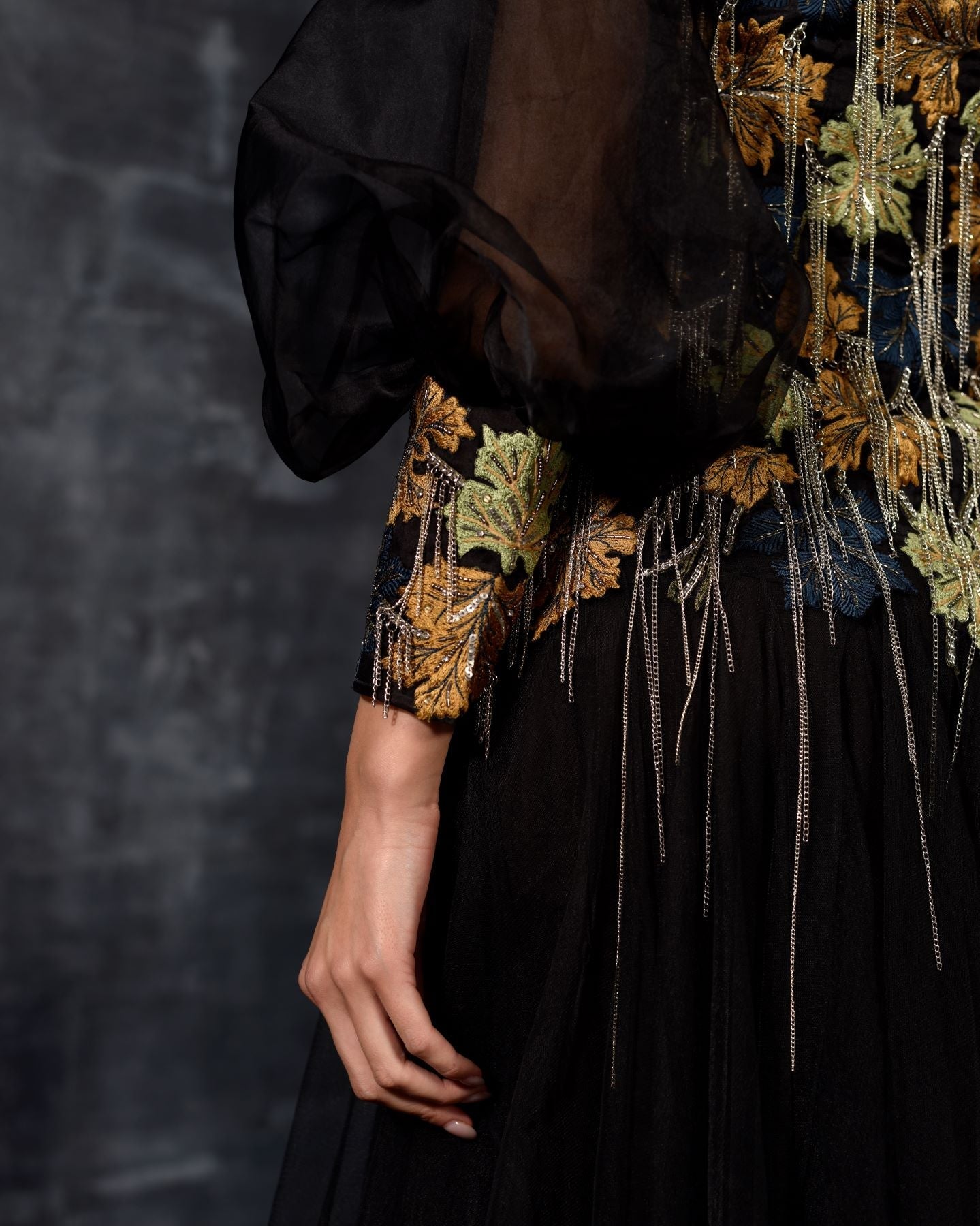 https://cdn.shopify.com/s/files/1/0088/3441/6706/files/a-elegant-black-off-shoulder-gown-features-a-dramatic-sleeve-top-6962012.jpg?v=1752388531