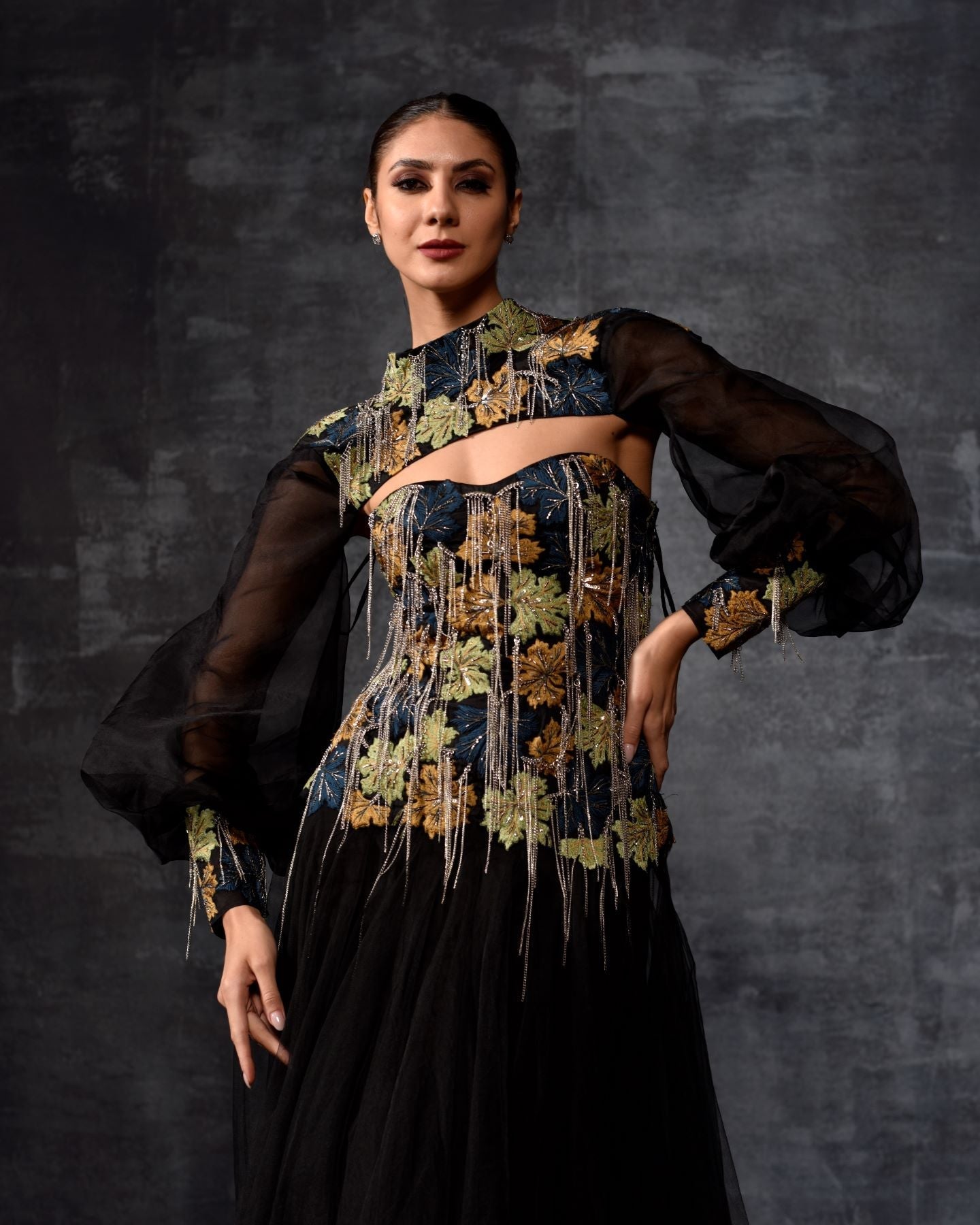 https://cdn.shopify.com/s/files/1/0088/3441/6706/files/a-elegant-black-off-shoulder-gown-features-a-dramatic-sleeve-top-8422239.jpg?v=1752388530