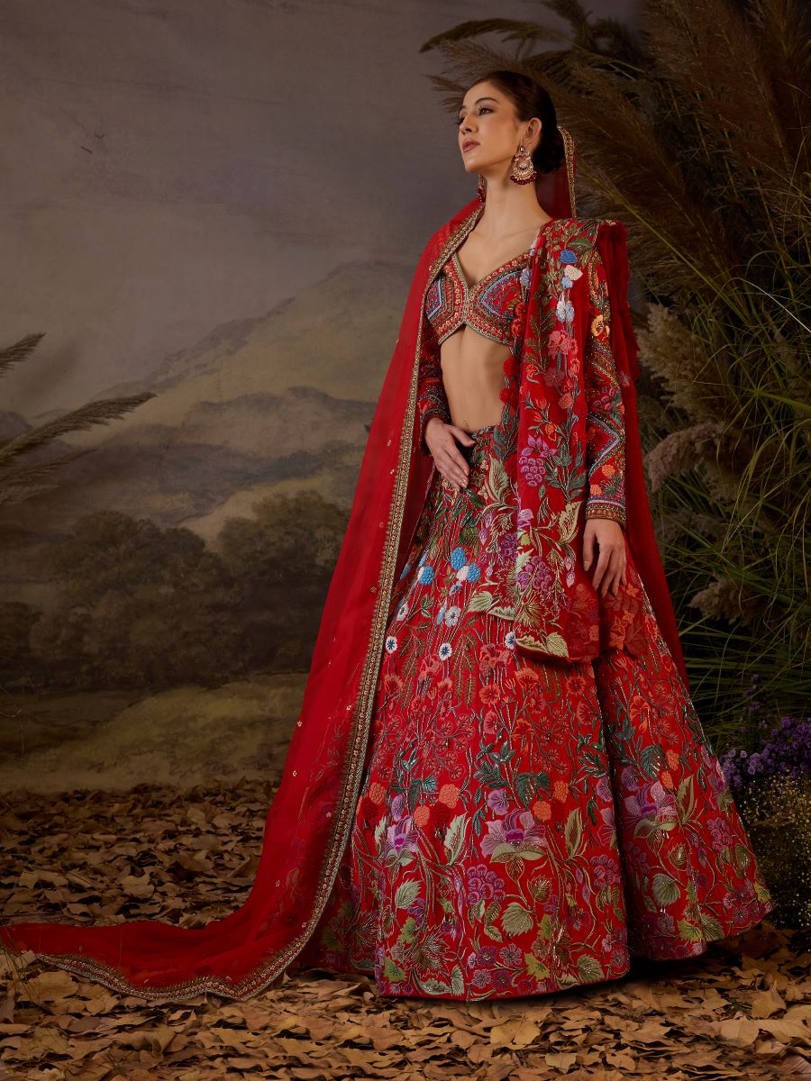 https://cdn.shopify.com/s/files/1/0088/3441/6706/files/a-red-organza-cotton-silk-lengha-with-v-neck-line-6525825.jpg?v=1752388669